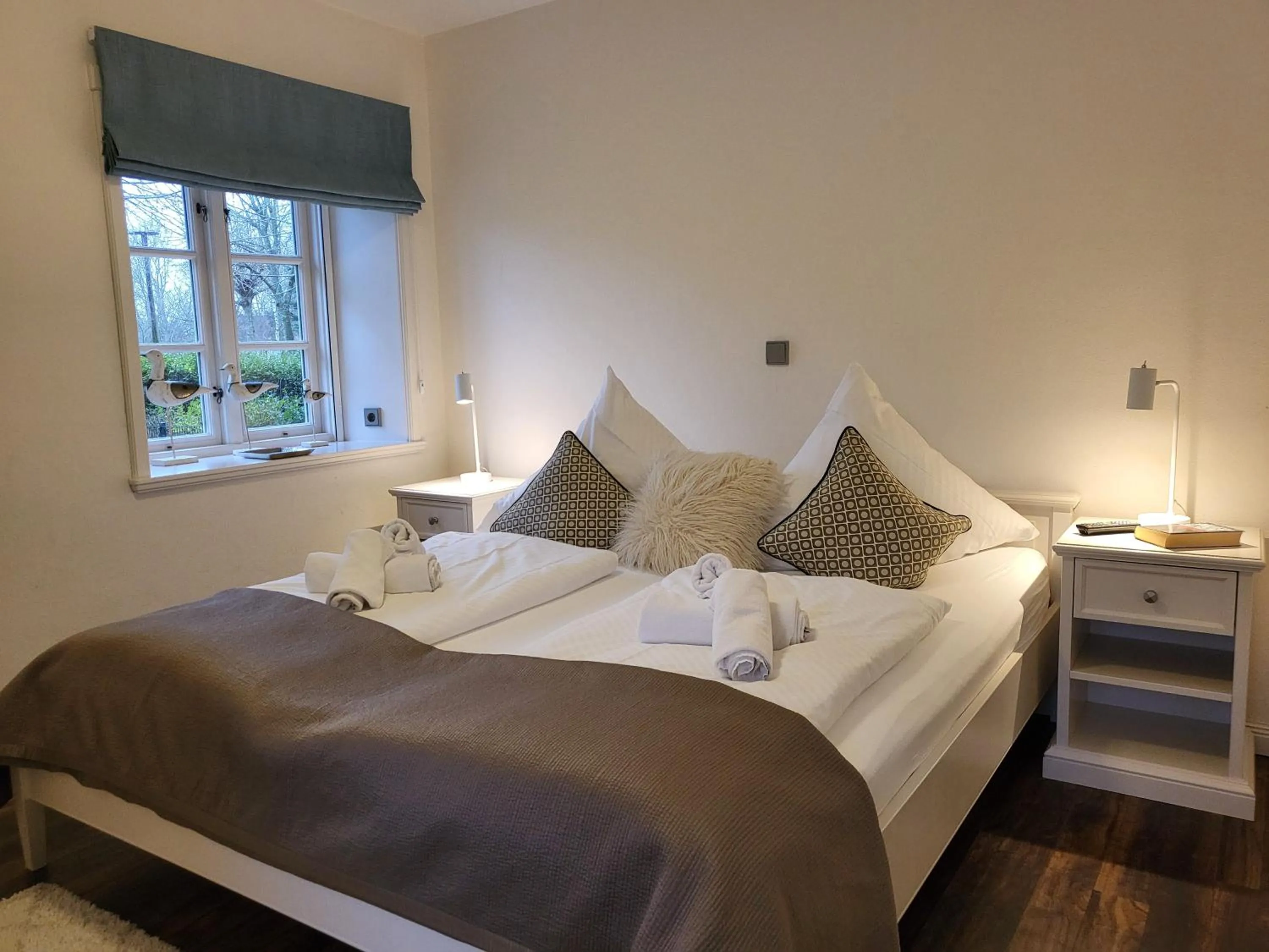 Bed in Ferienwohnung 1 im Reetdachhaus Mühlenhof