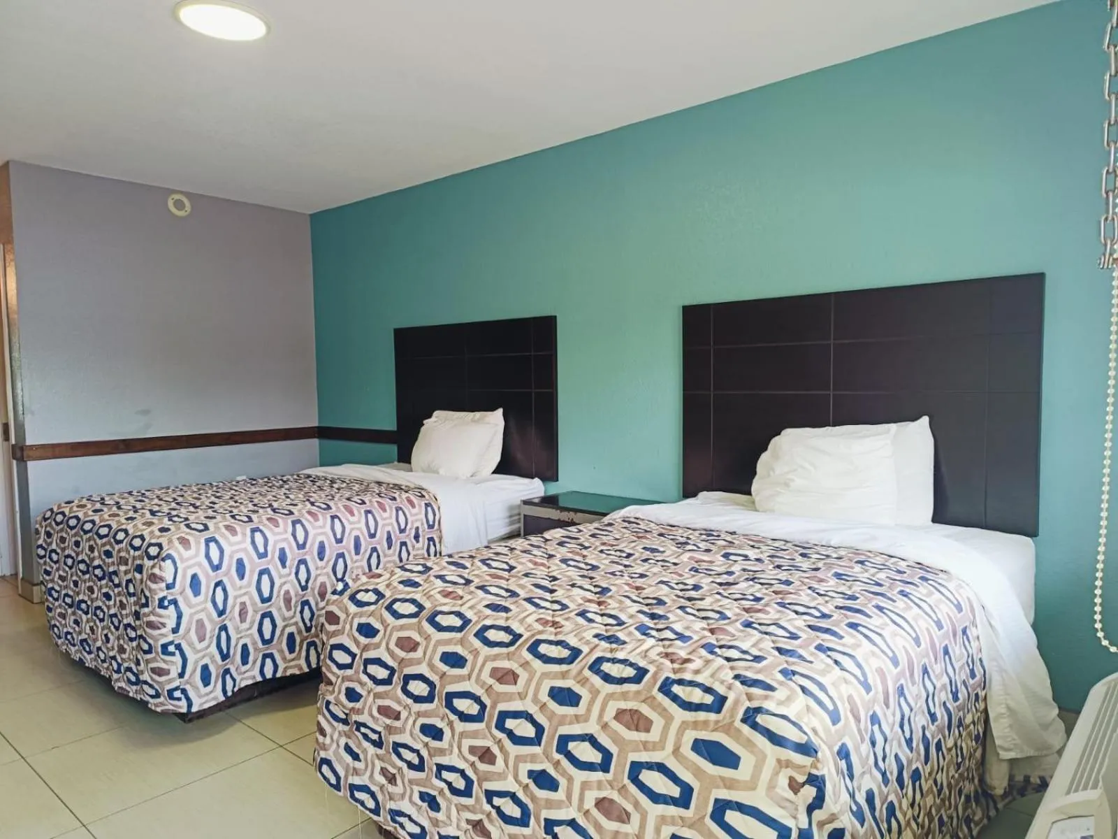 Bedroom, Bed in Woodfield Inn & Suites Hotel O, Yoakum TX 111