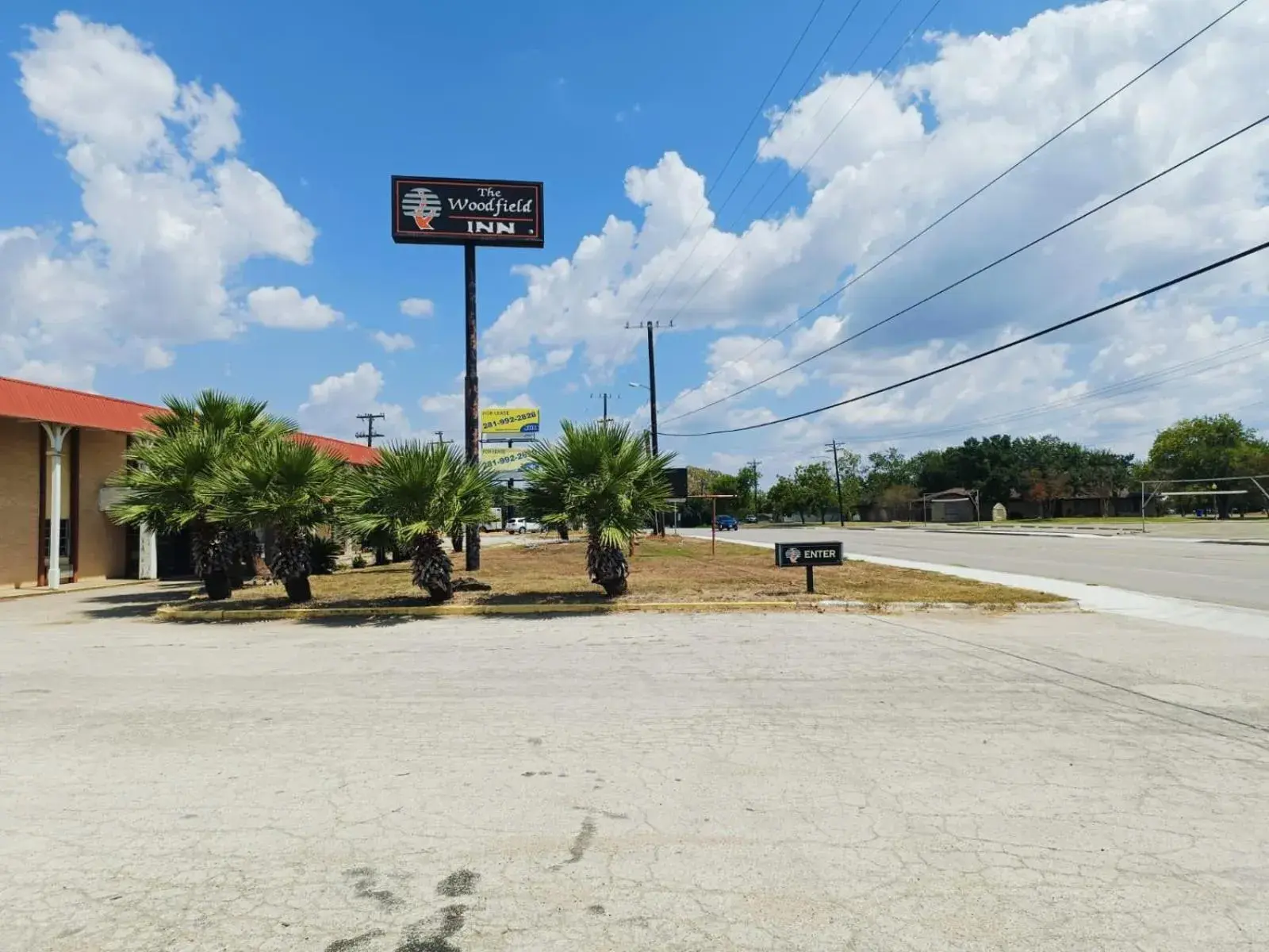 Property building in Woodfield Inn & Suites Hotel O, Yoakum TX 111 Property building in Woodfield Inn & Suites Hotel O, Yoakum TX 111