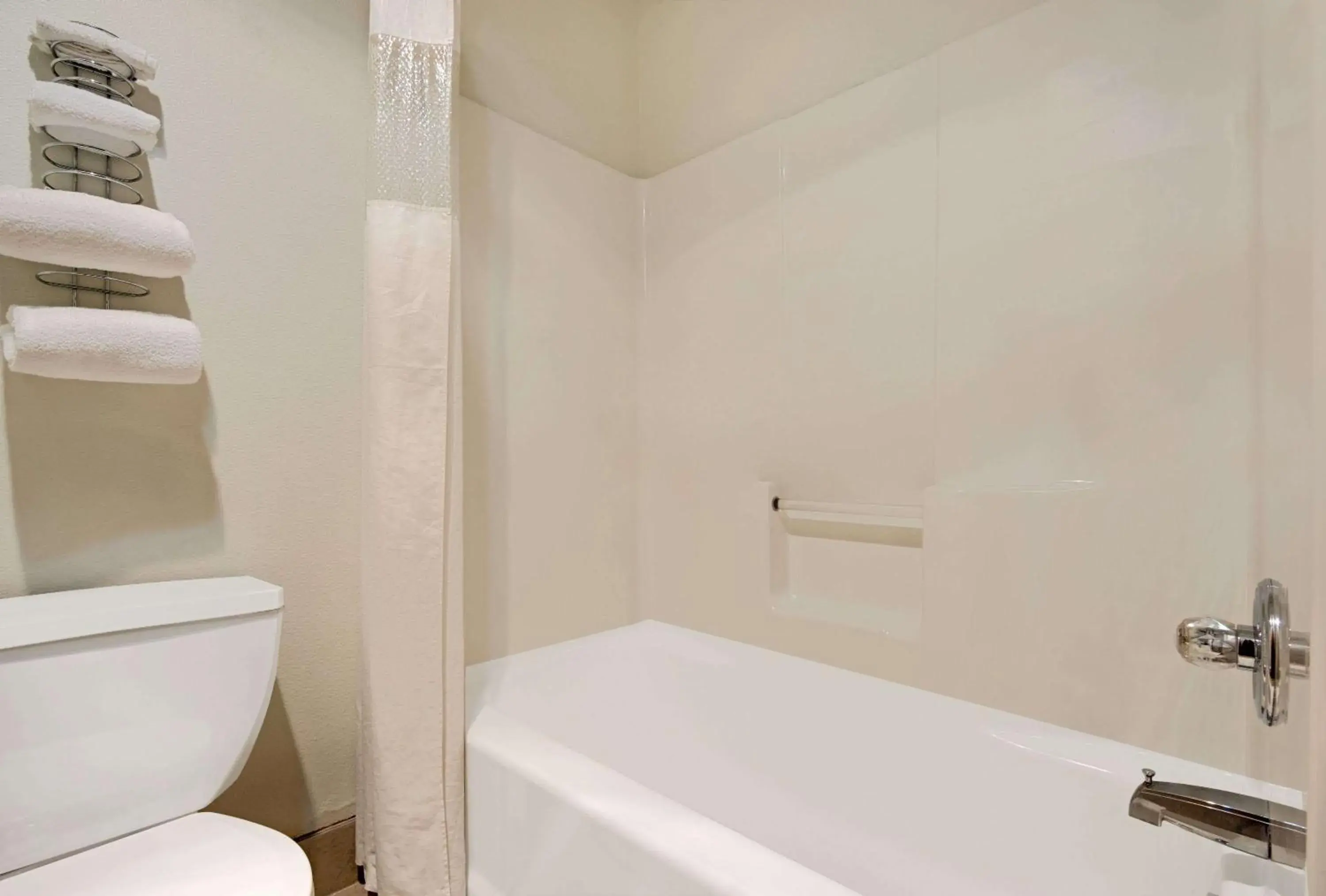 Photo of the whole room in Super 8 by Wyndham Riverside/Kansas City Photo of the whole room in Super 8 by Wyndham Riverside/Kansas City