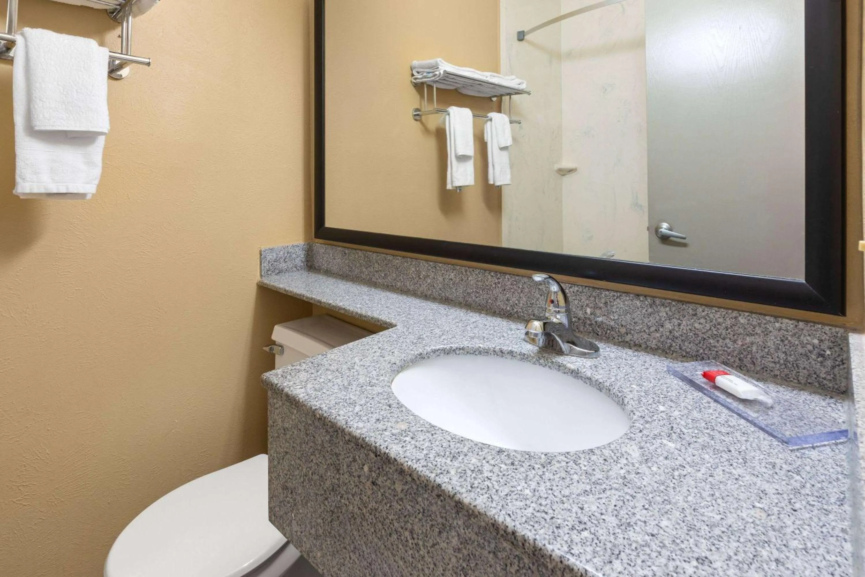 Bathroom in Days Inn by Wyndham Wauseon