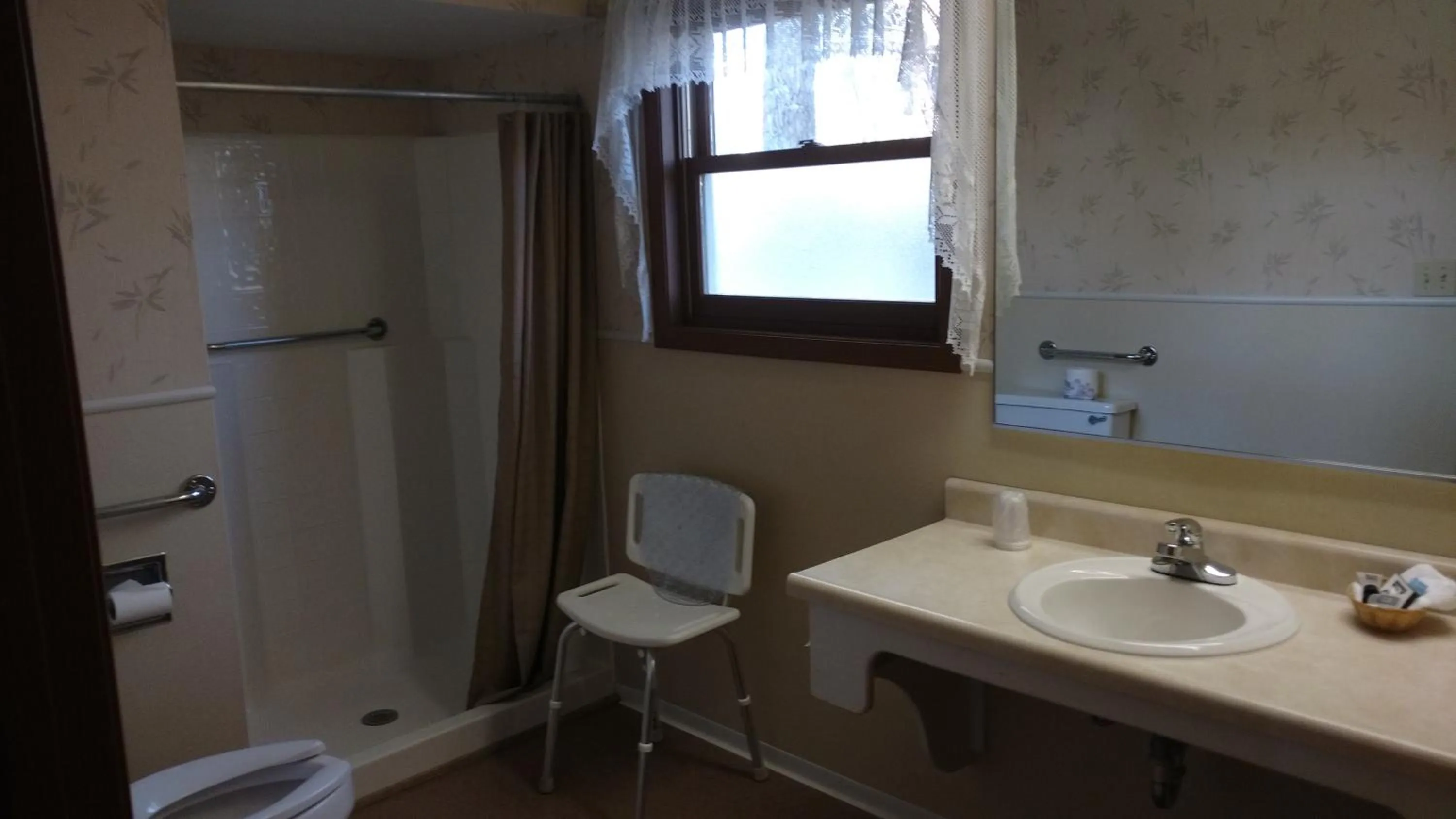 Bathroom in Stagecoach Inn & Suites