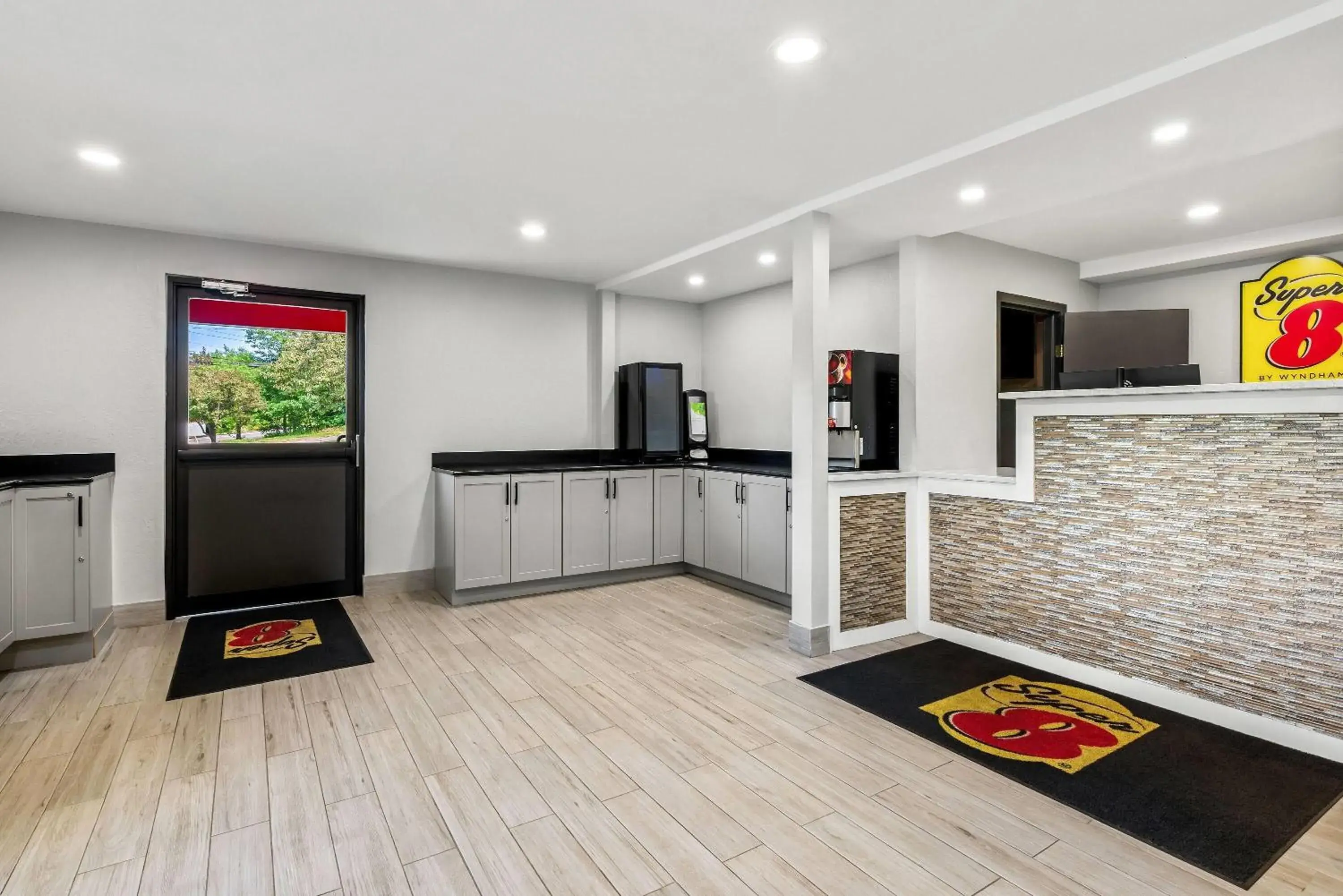 Lobby or reception in Super 8 by Wyndham Lewiston Auburn Area Lobby or reception in Super 8 by Wyndham Lewiston Auburn Area