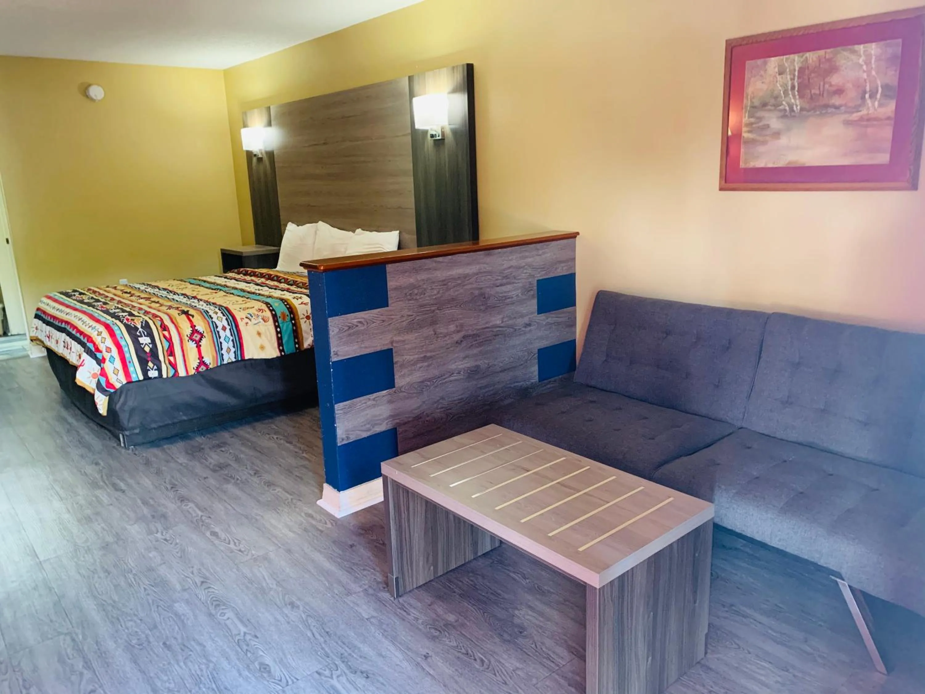 Bed in Log Cabin Inn