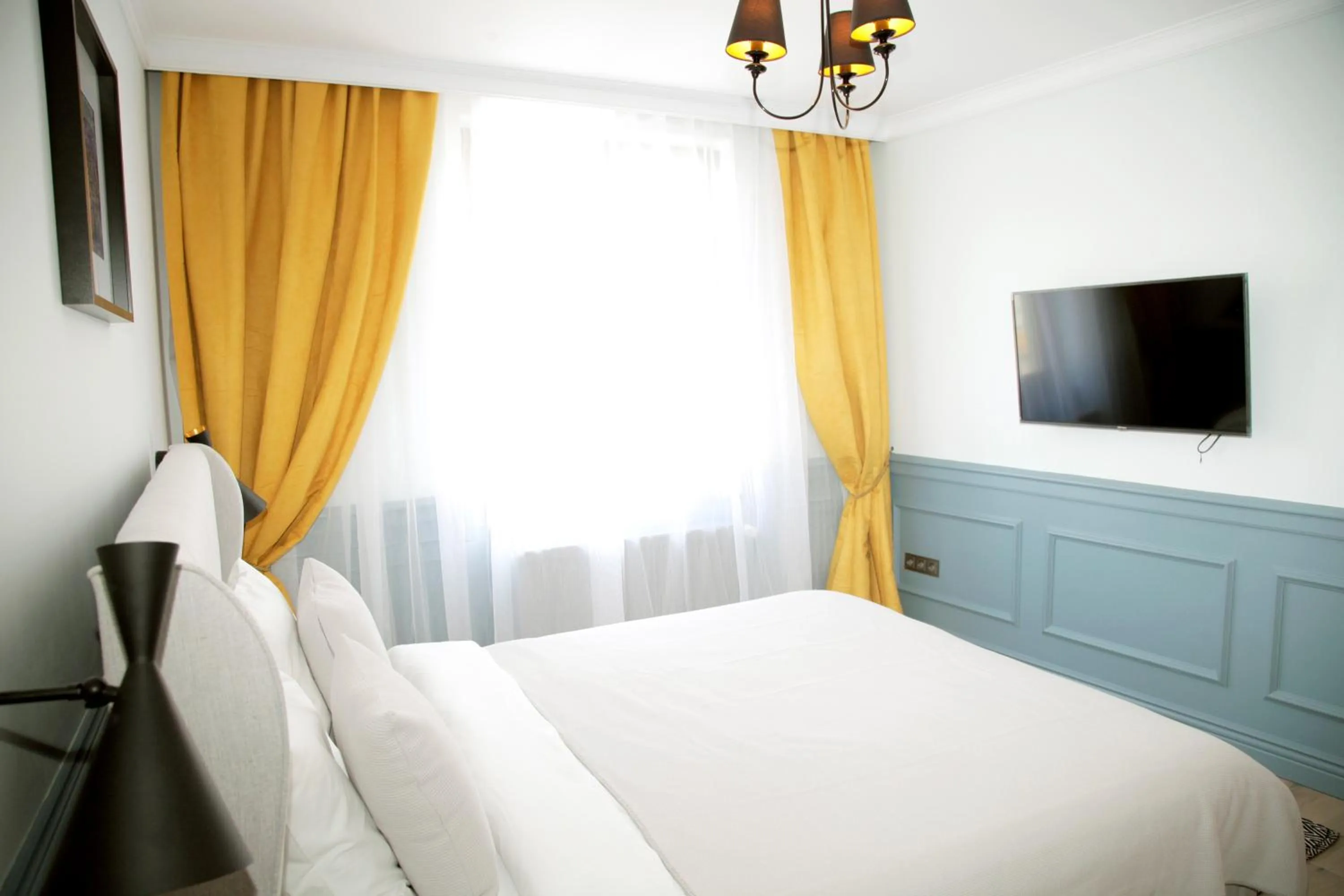 Bed in Central Boutique Apartments
