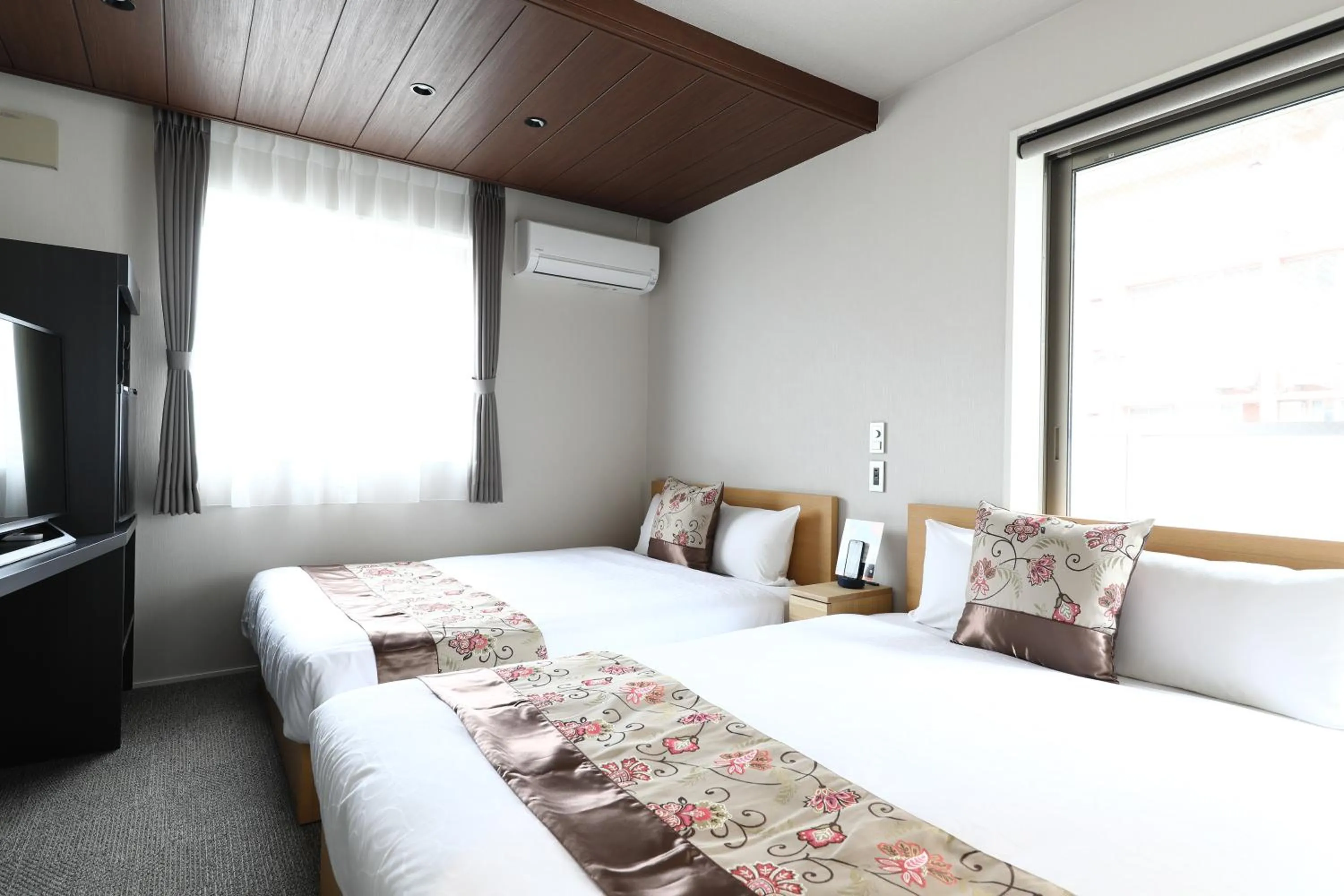 Bed in GRAND BASE Hakata City