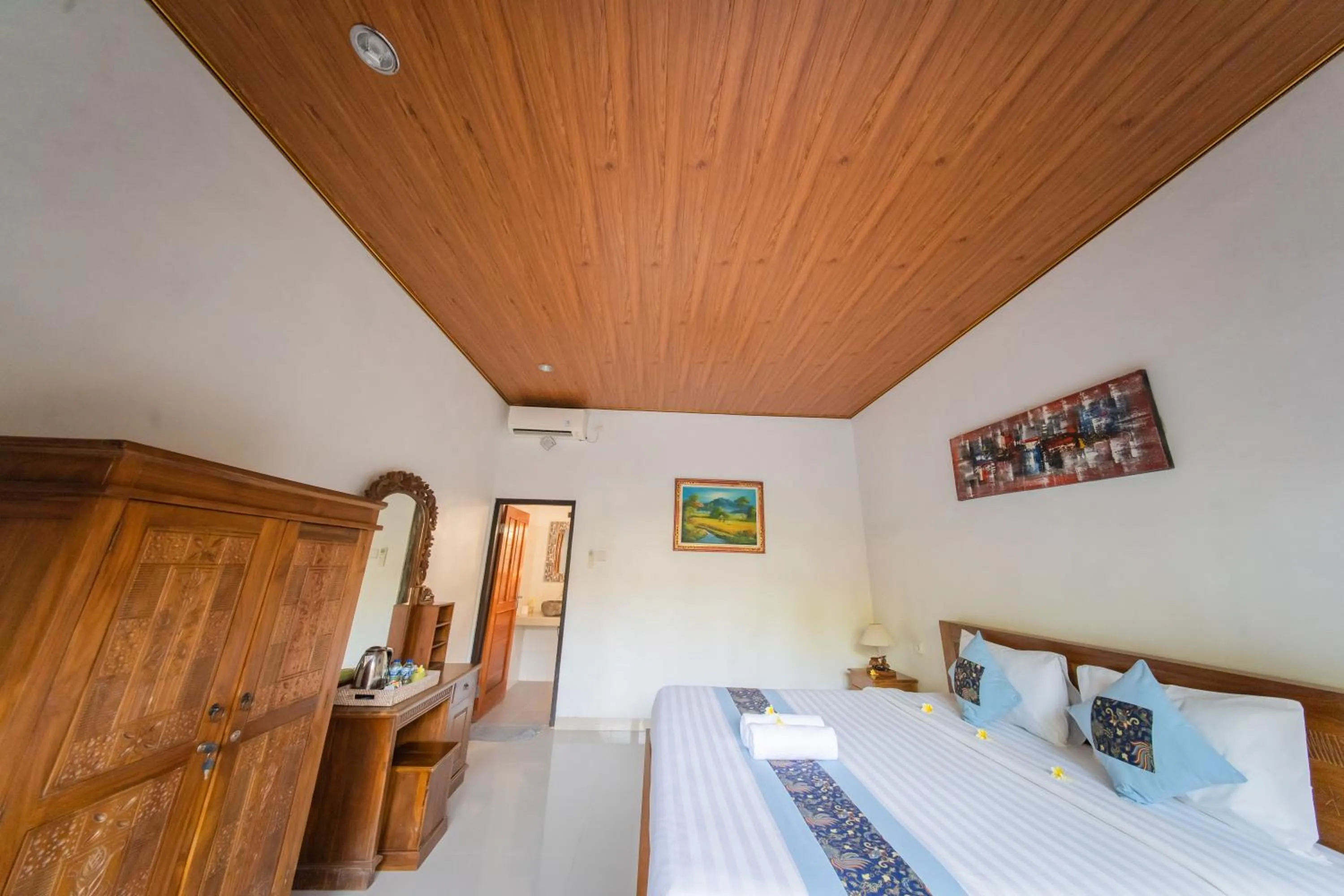 Bed in Surya Maha Bungallo