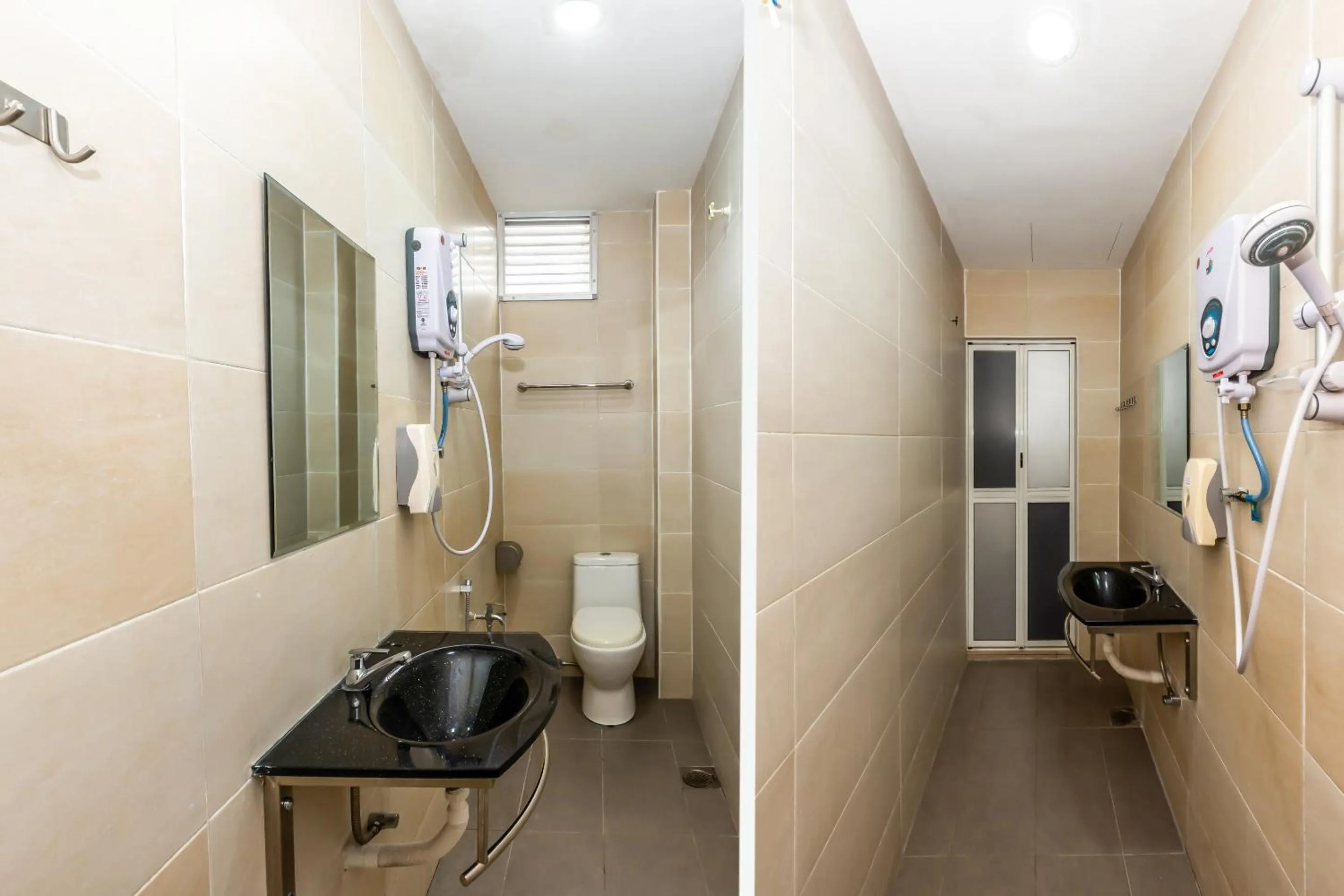 Bathroom in OYO 1185 Ho Hotel