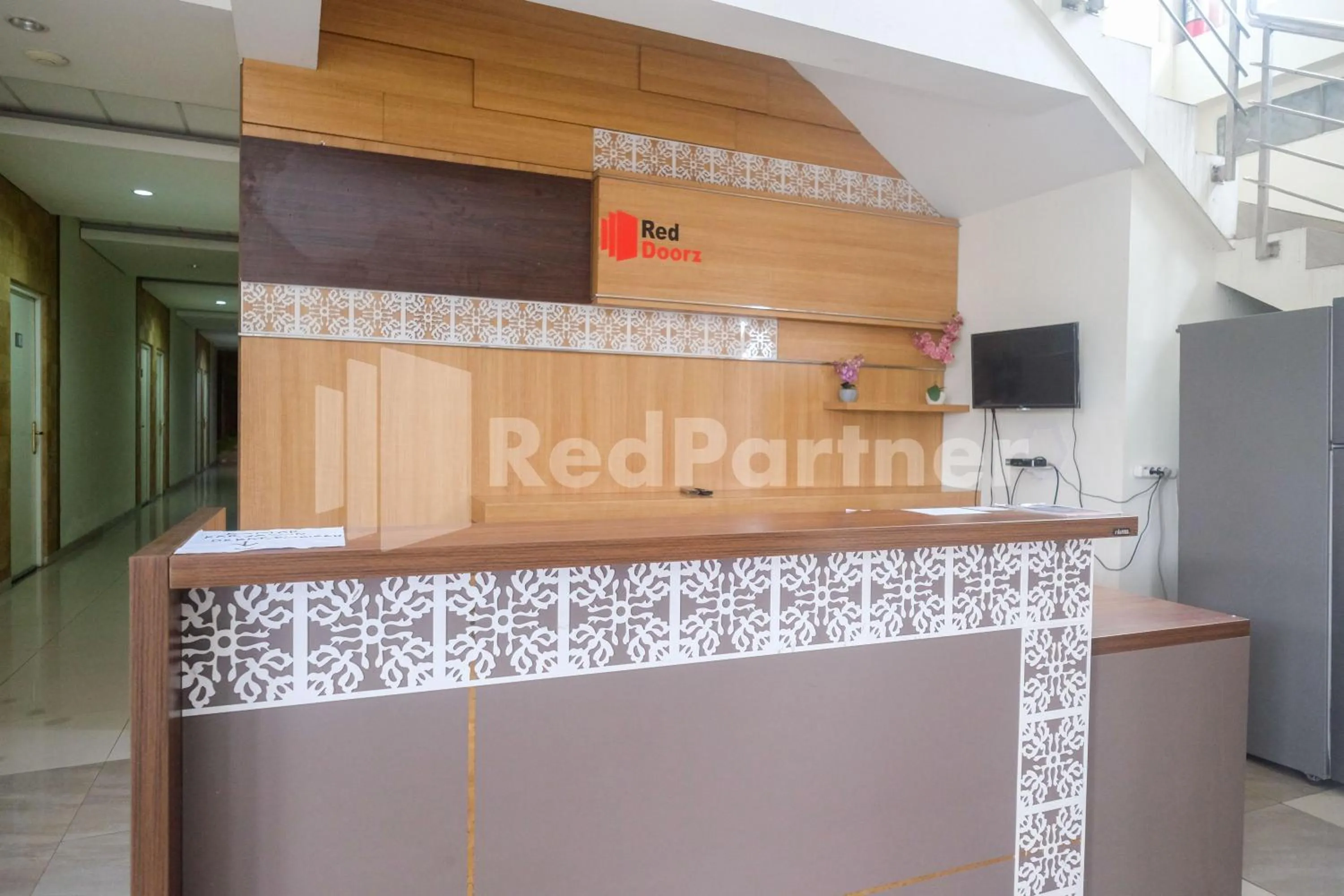 Lobby or reception in Garuda Guesthouse Yogyakarta RedPartner