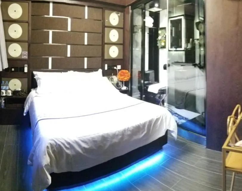 Bed in Star City Hotel