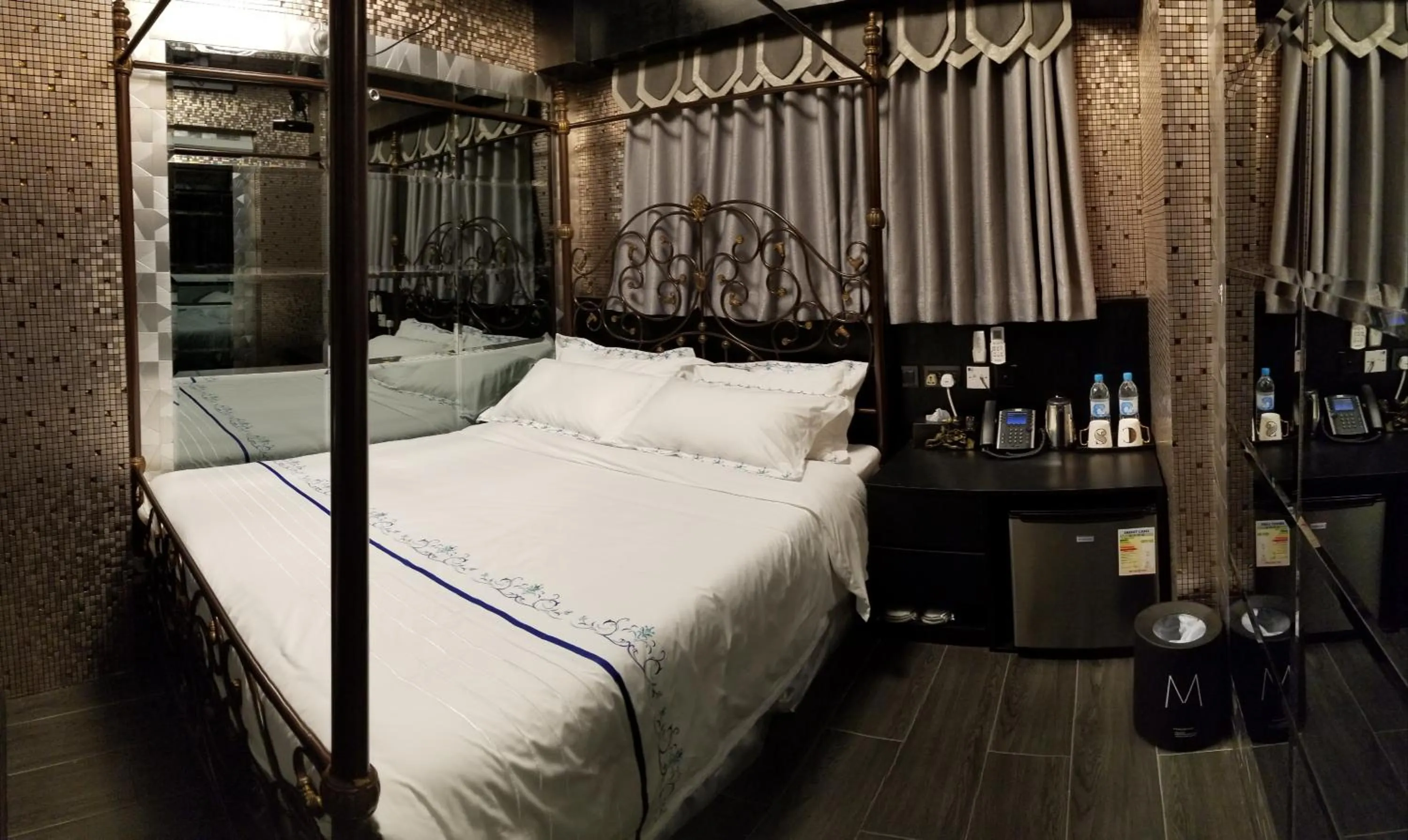 Bed in Star City Hotel