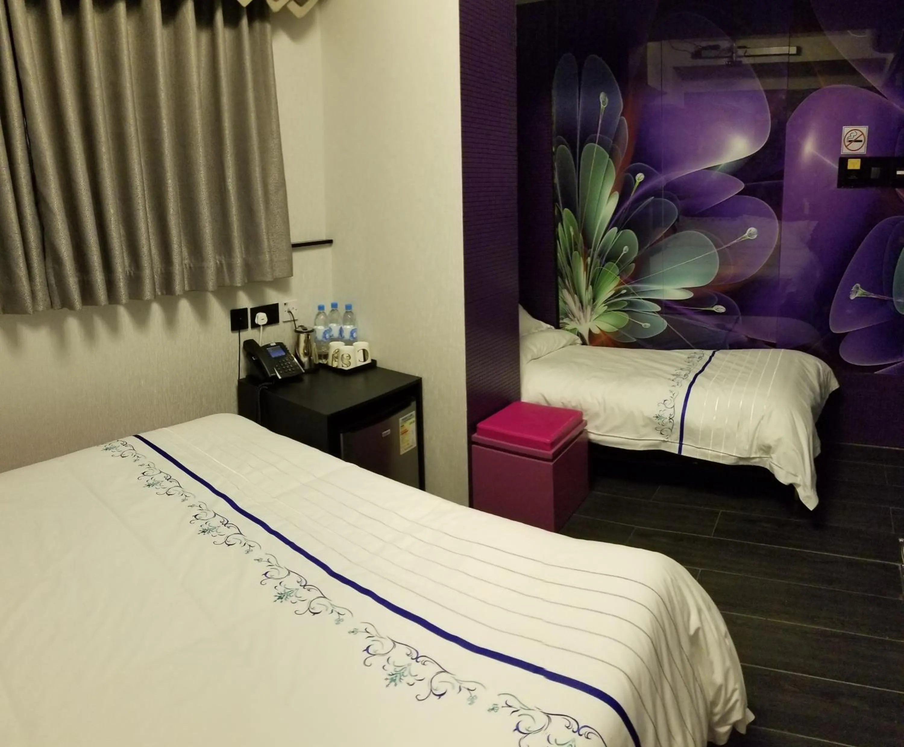 Bed in Star City Hotel