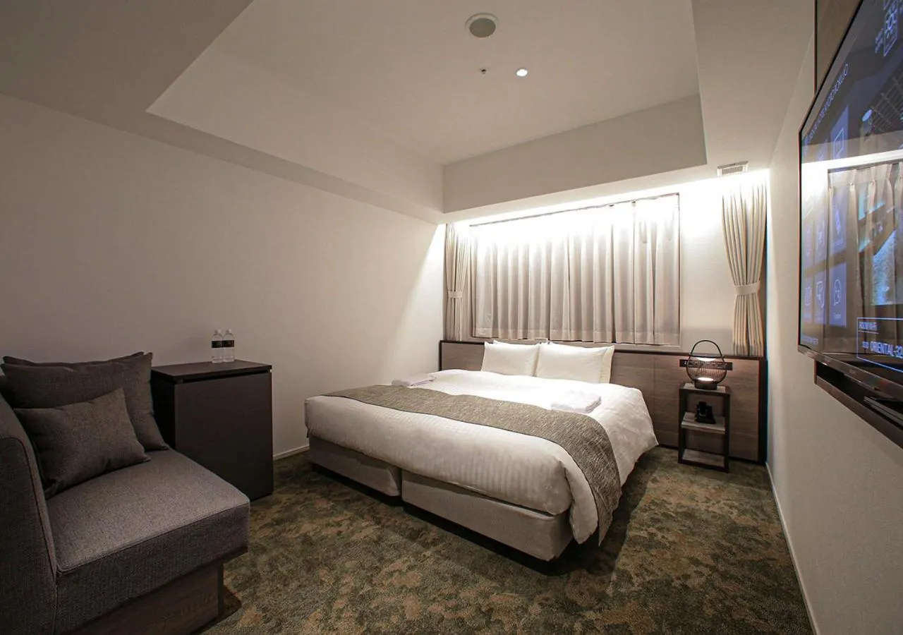 Bed in ORIENTAL HOTEL KYOTO ROKUJO