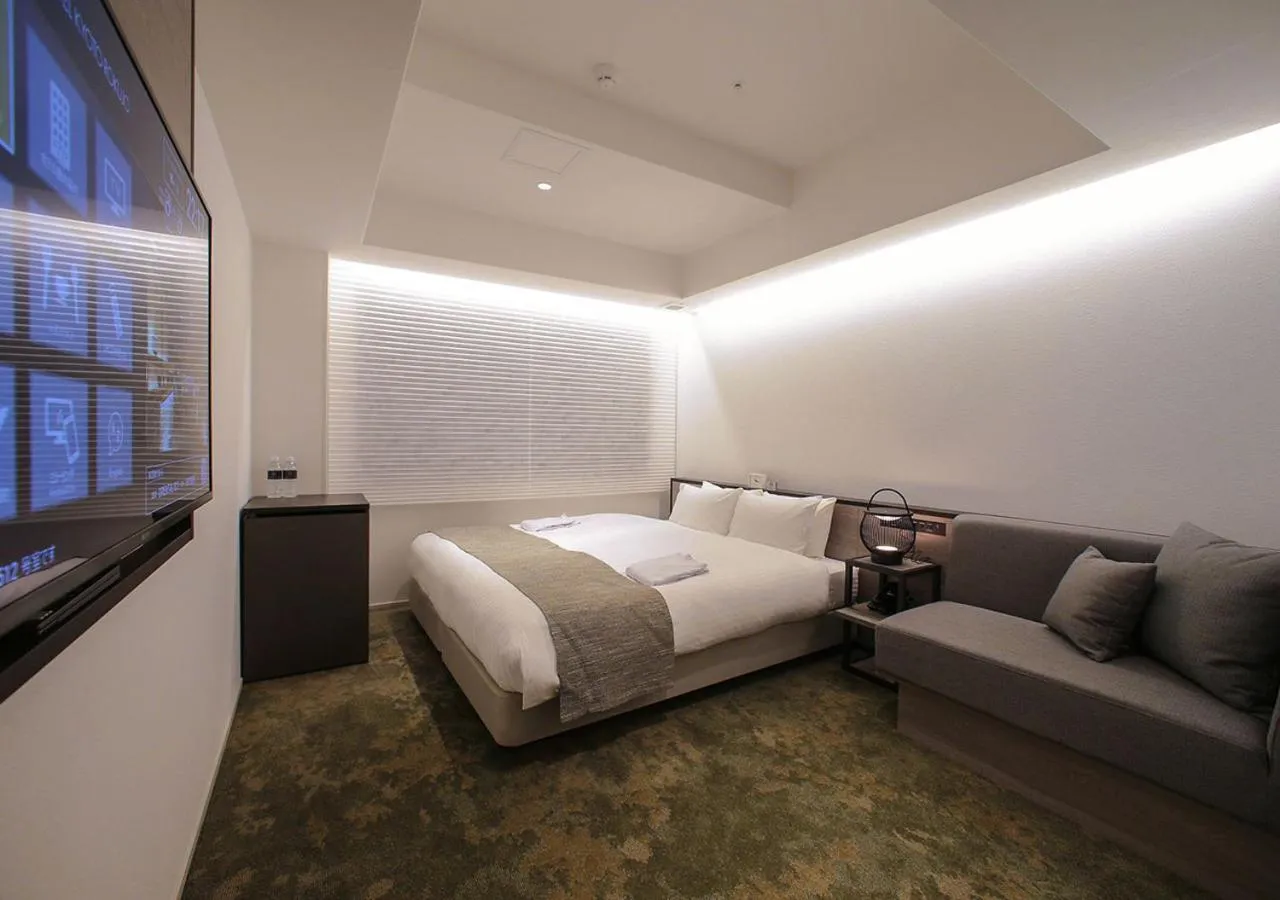 Bed in ORIENTAL HOTEL KYOTO ROKUJO