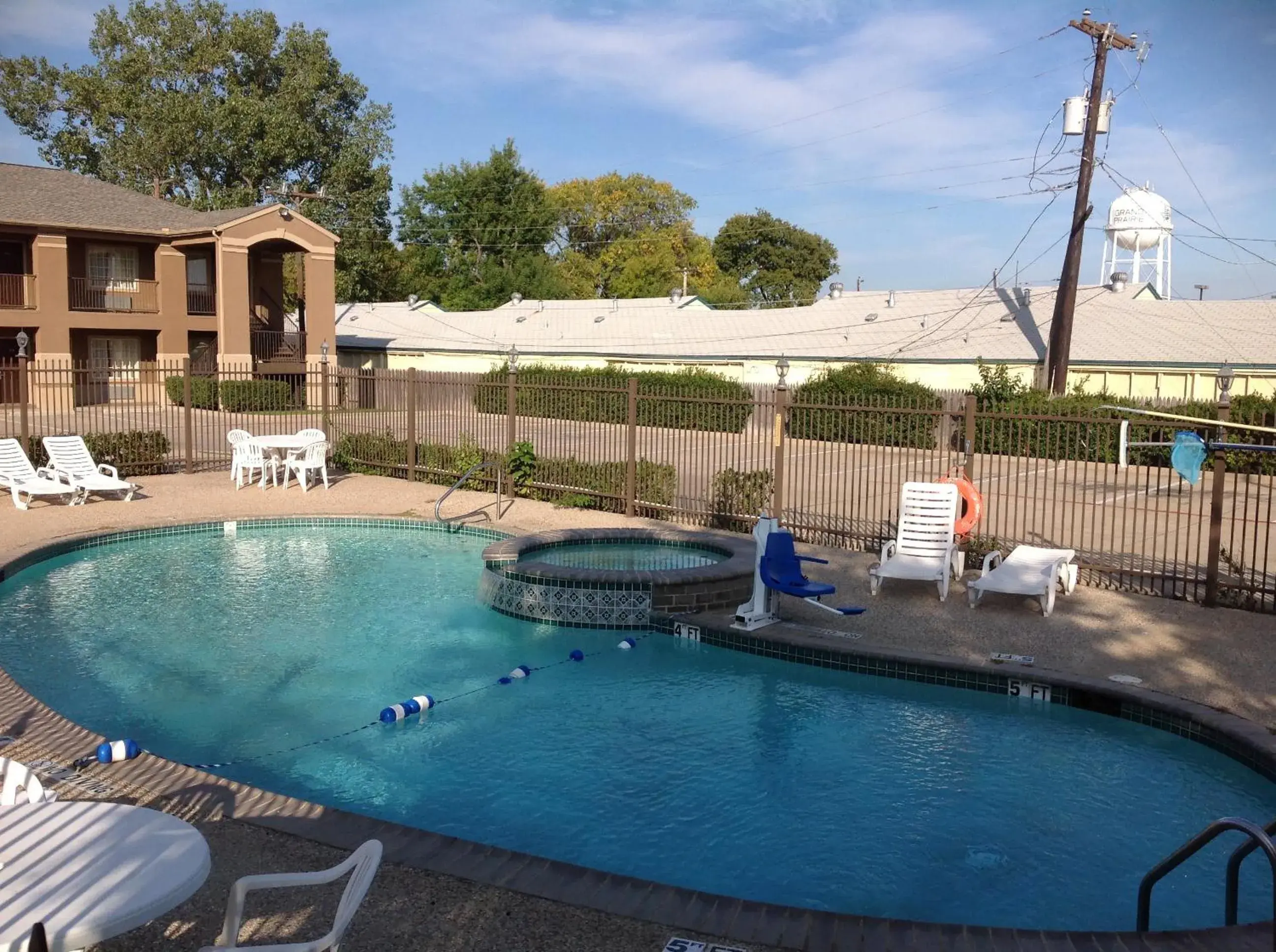 Swimming pool in Howard Johnson by Wyndham Grand Prairie Near Lone Star Park Swimming pool in Howard Johnson by Wyndham Grand Prairie Near Lone Star Park