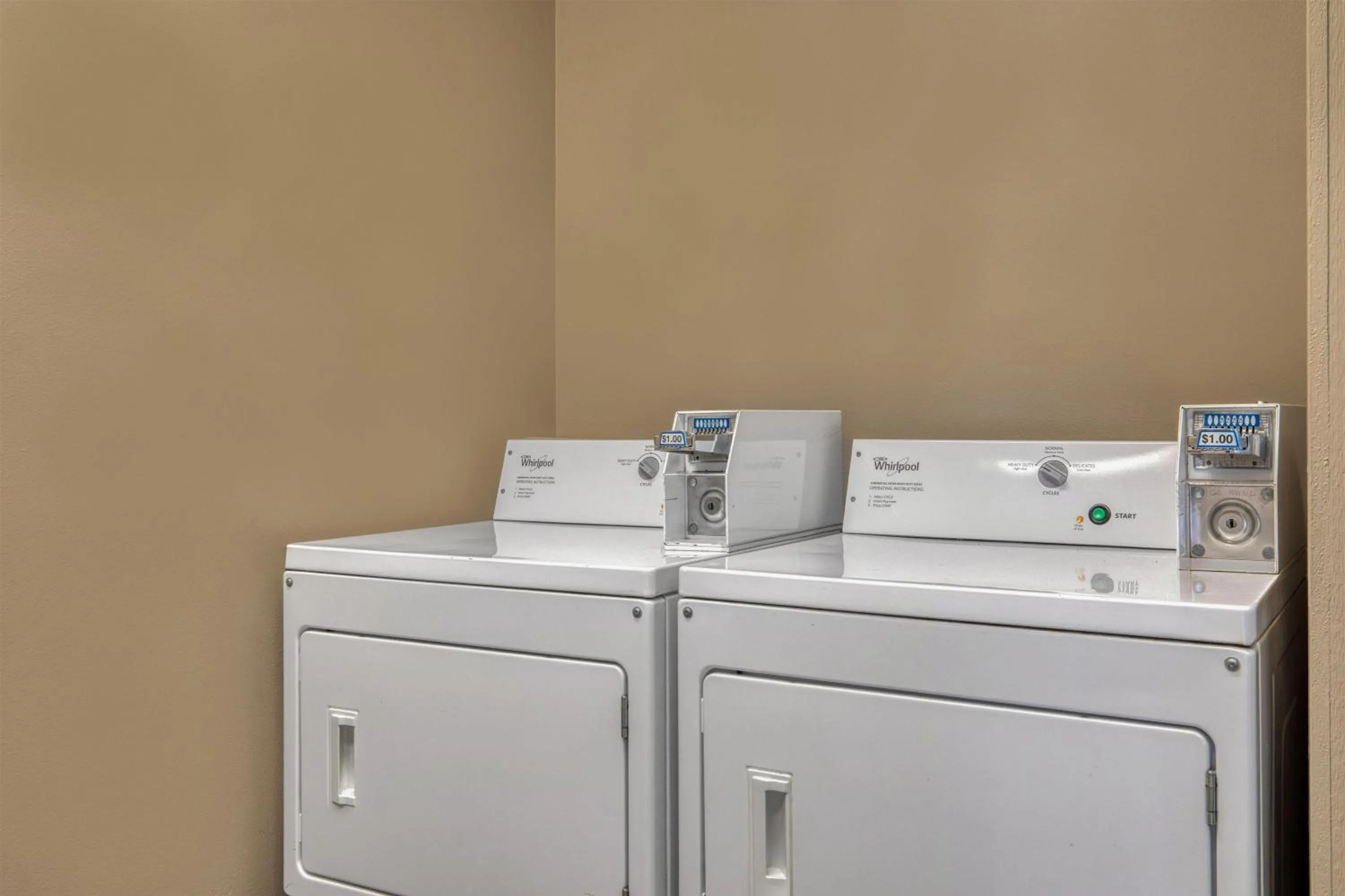 laundry in SureStay Hotel by Best Western Leesville