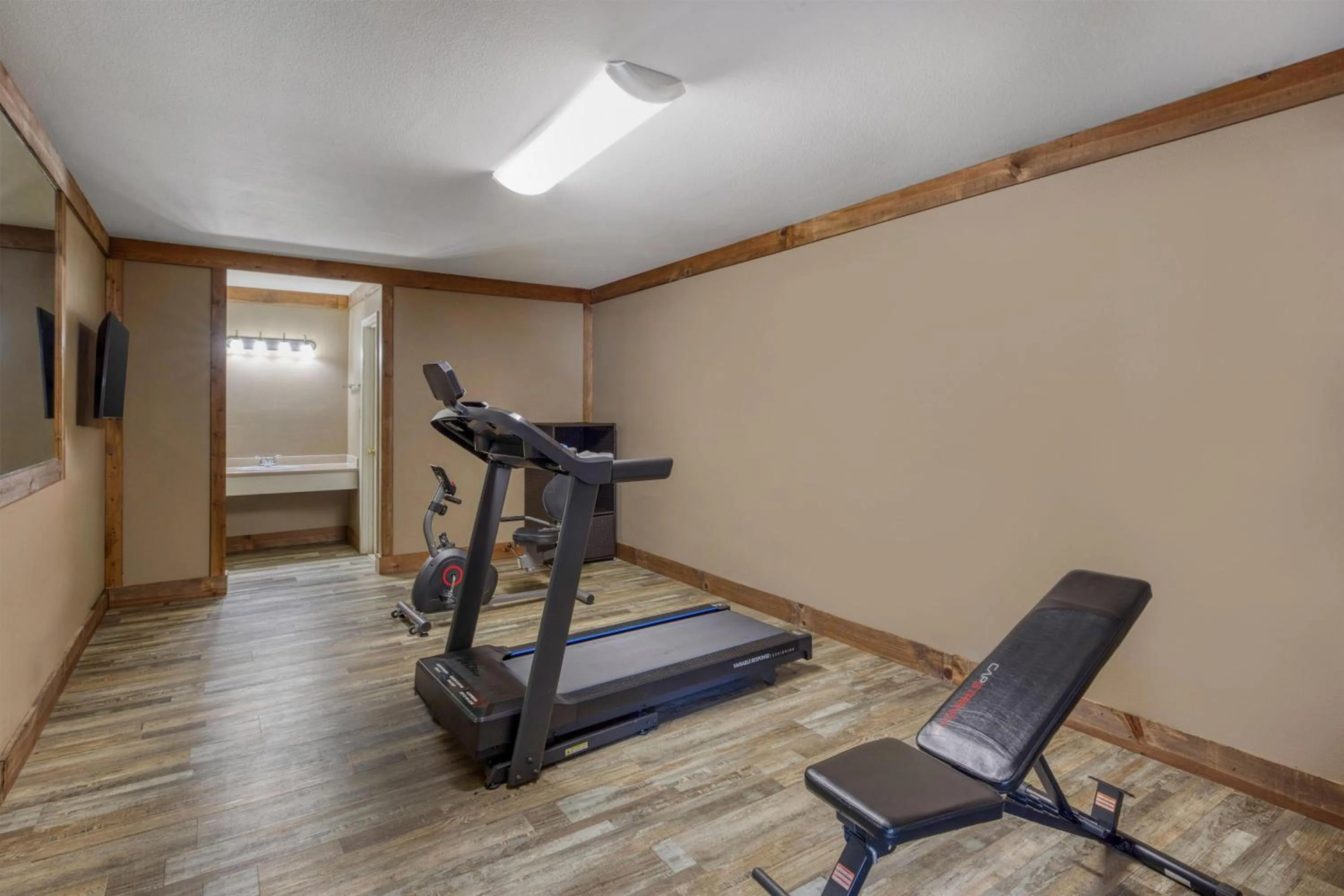 Fitness centre/facilities in SureStay Hotel by Best Western Leesville