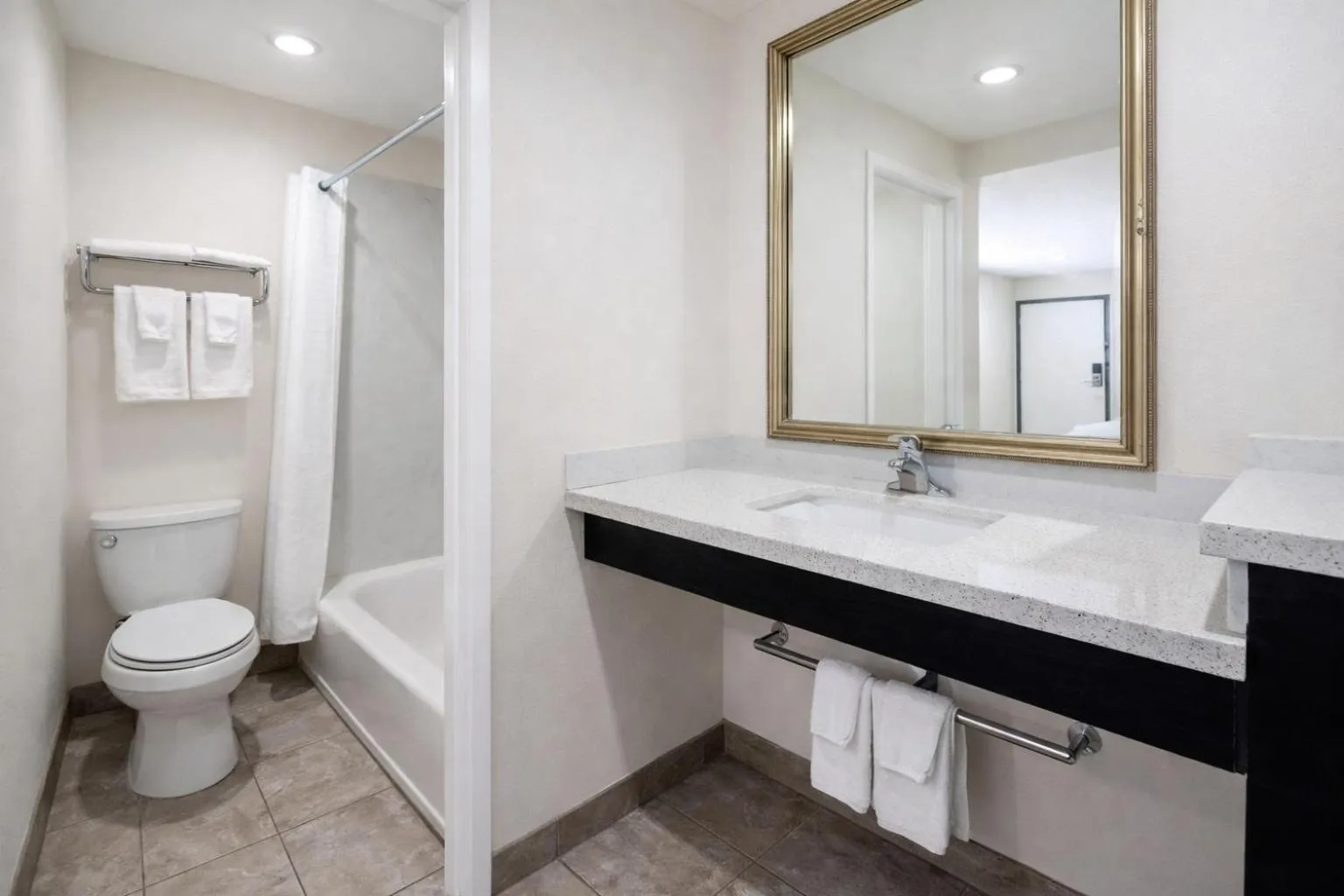 Toilet in Super 8 by Wyndham Bakersfield CA Near Airport