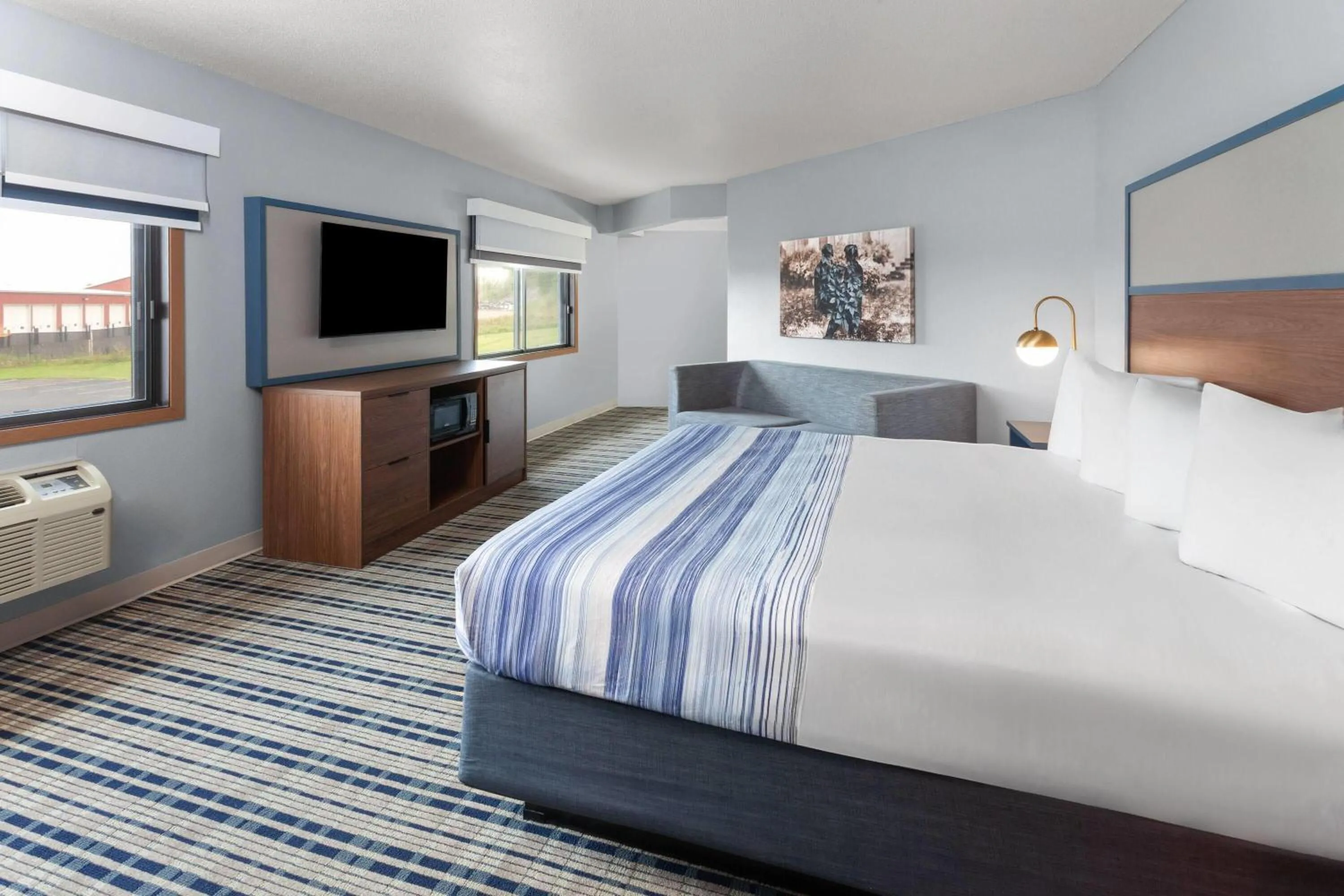 Photo of the whole room, Bed in AmericInn by Wyndham West Salem
