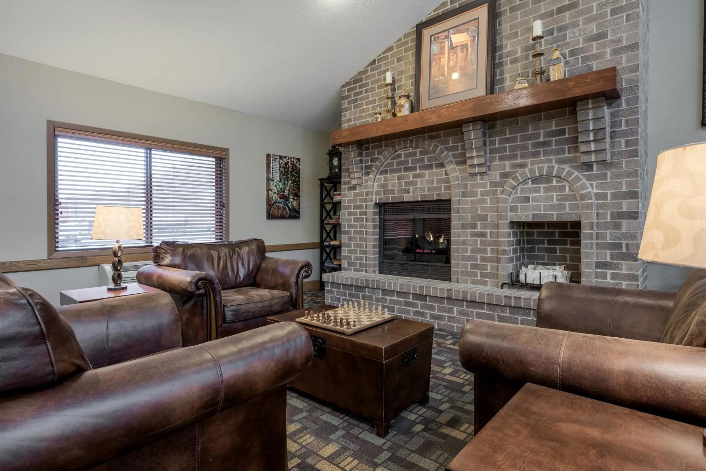 Living room in AmericInn by Wyndham West Salem