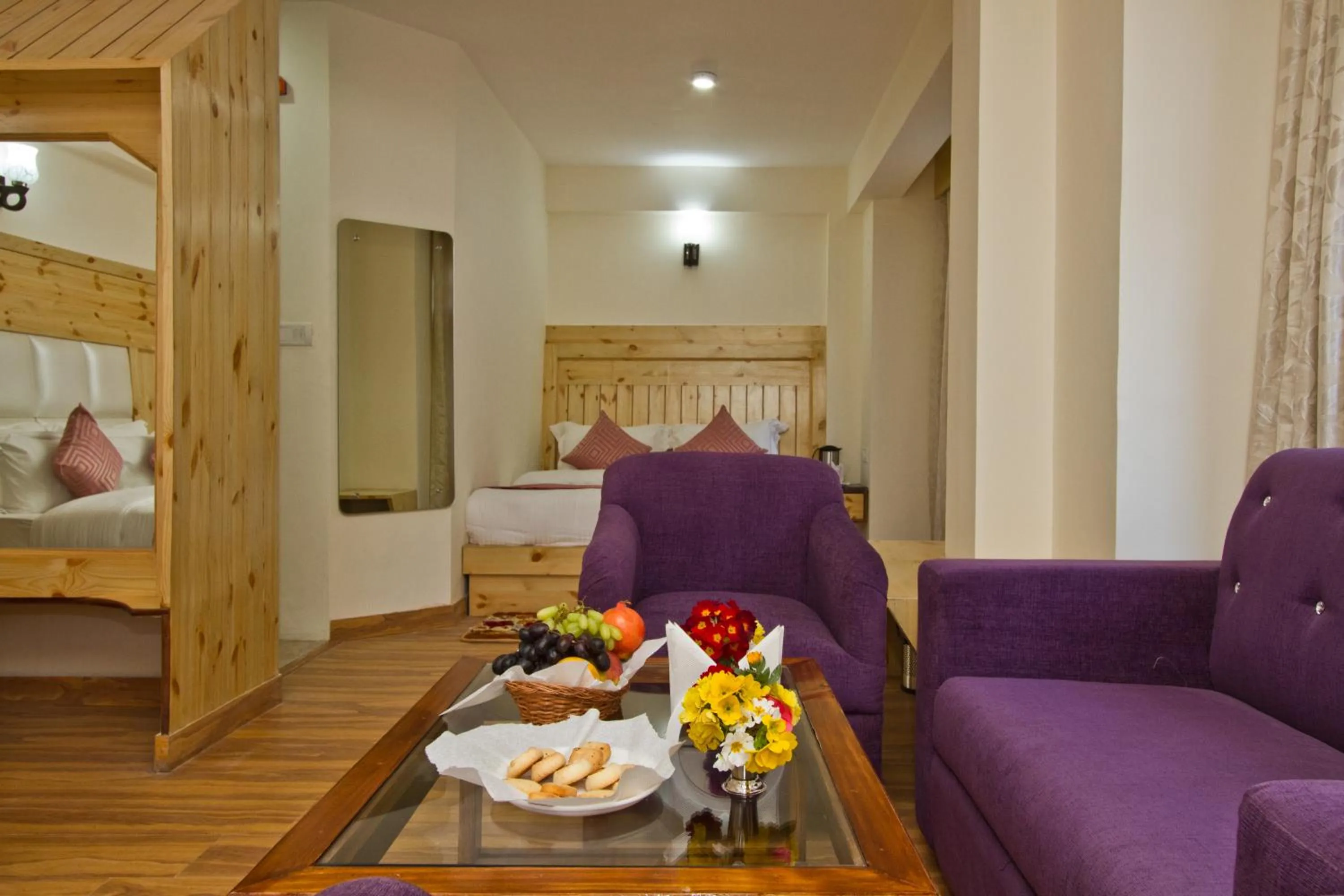 Seating area, Bed in Hotel Hayer Regency