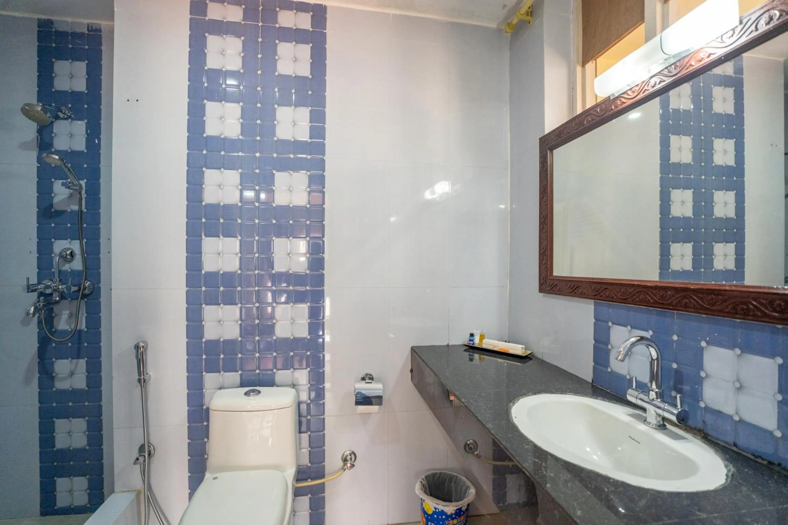 Toilet in Avocado Orchid Resort