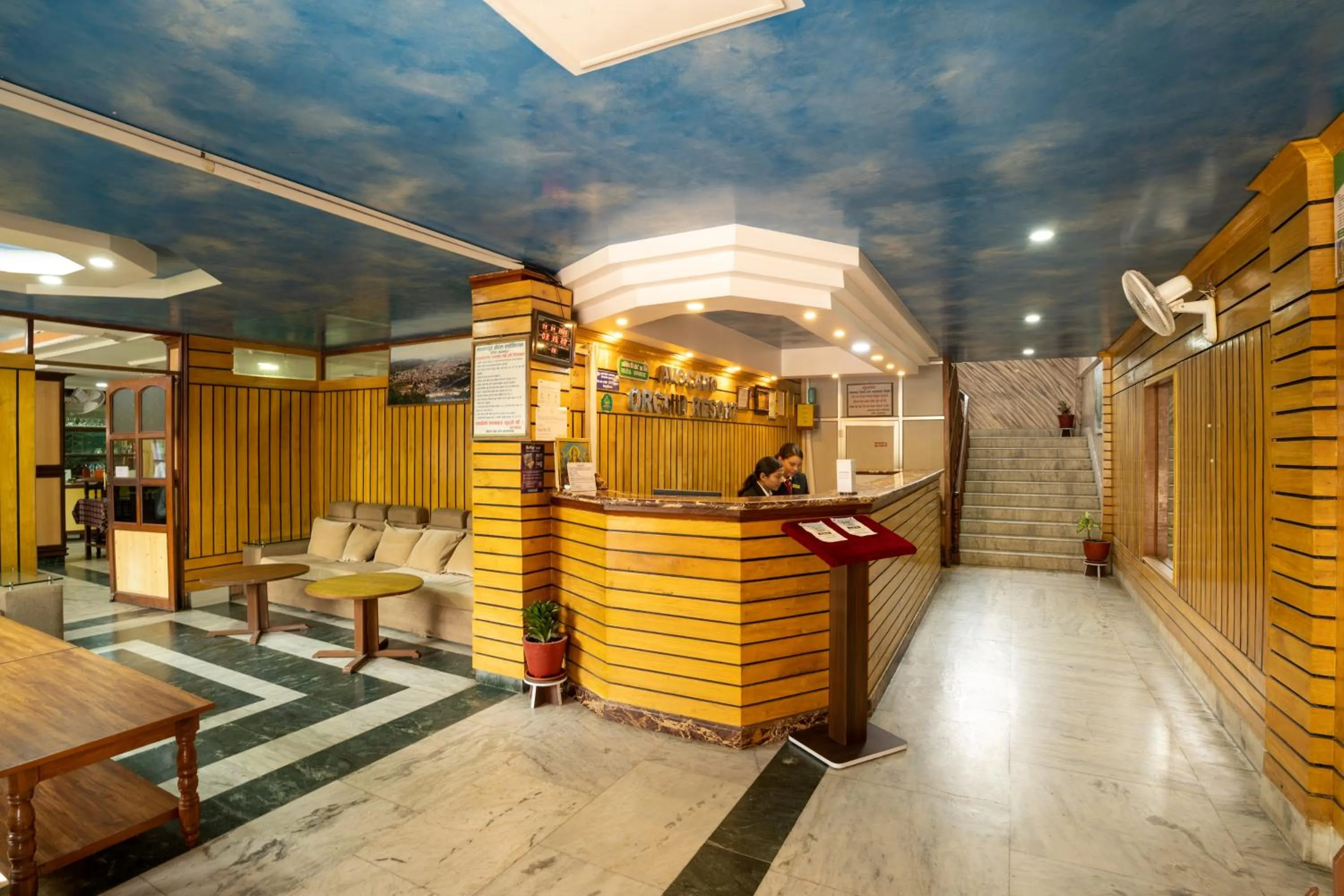 Seating area in Avocado Orchid Resort