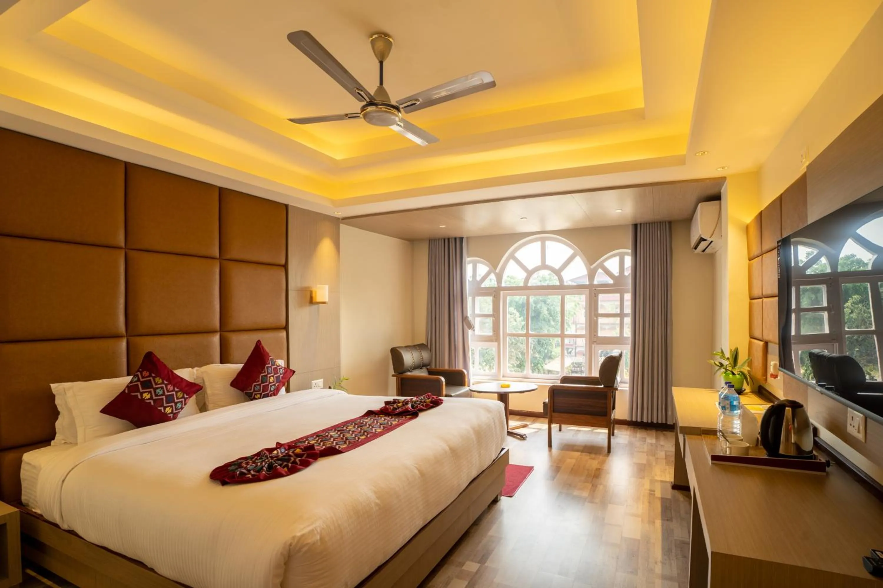 Bed in Avocado Orchid Resort