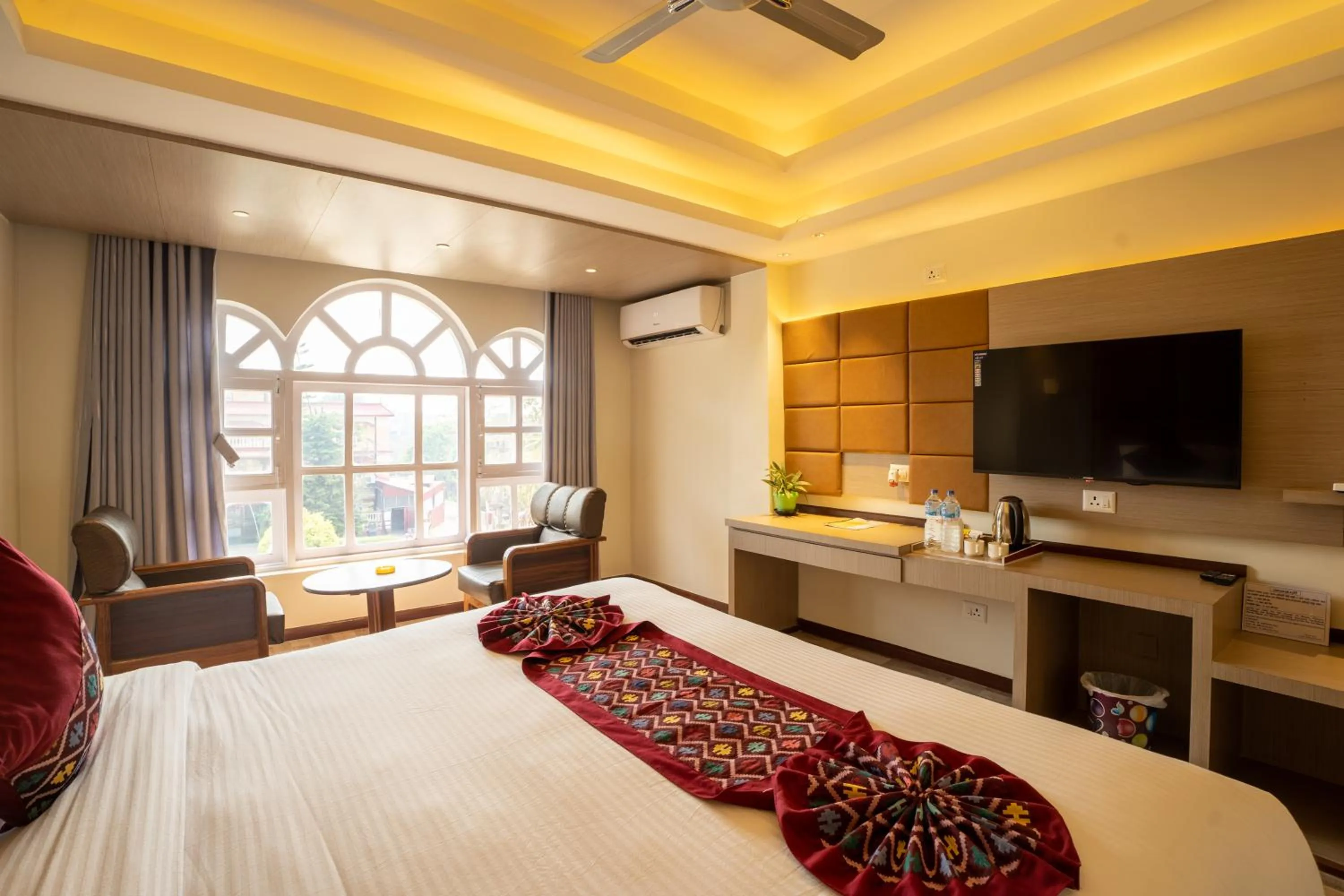 Bed in Avocado Orchid Resort