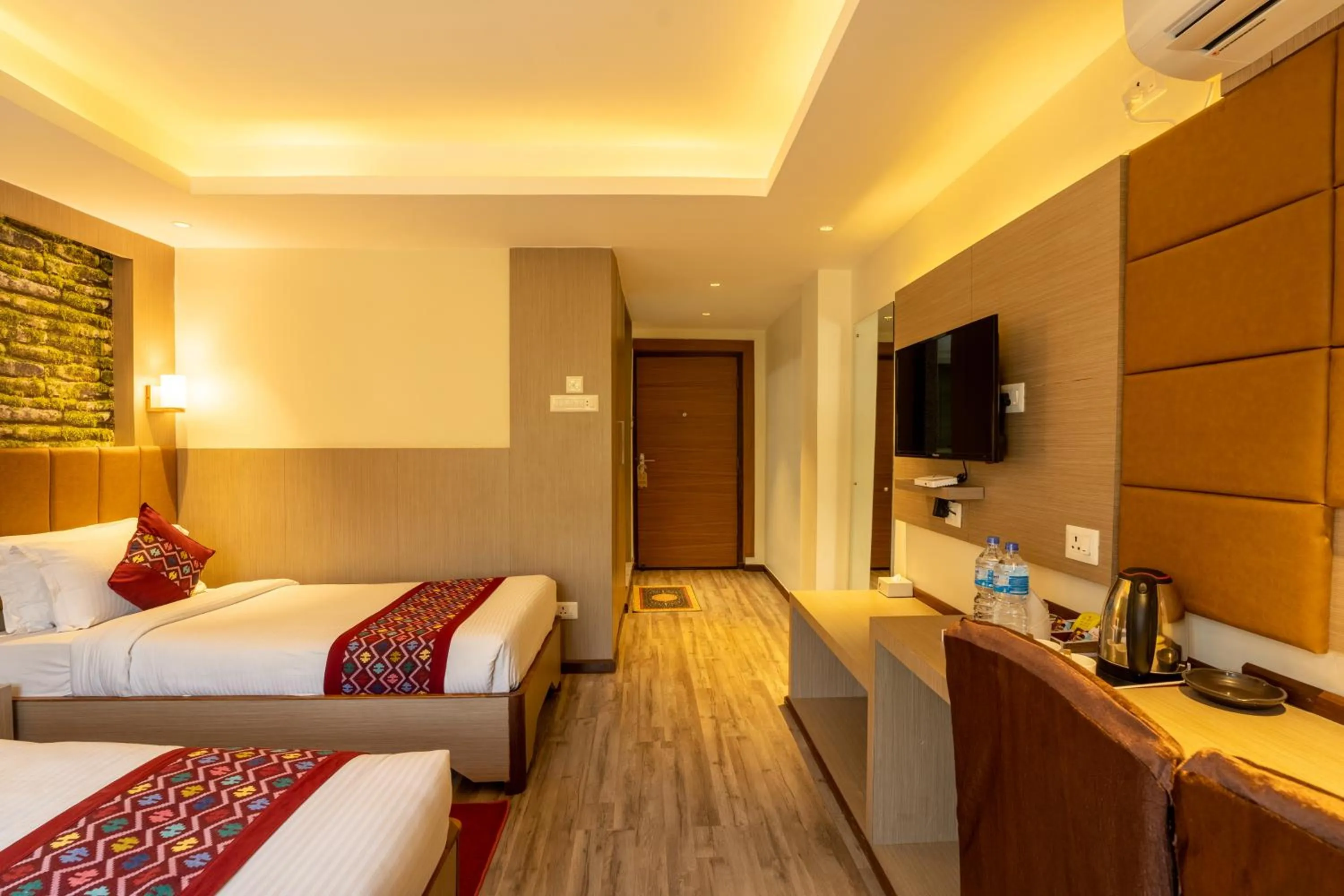 Bed in Avocado Orchid Resort