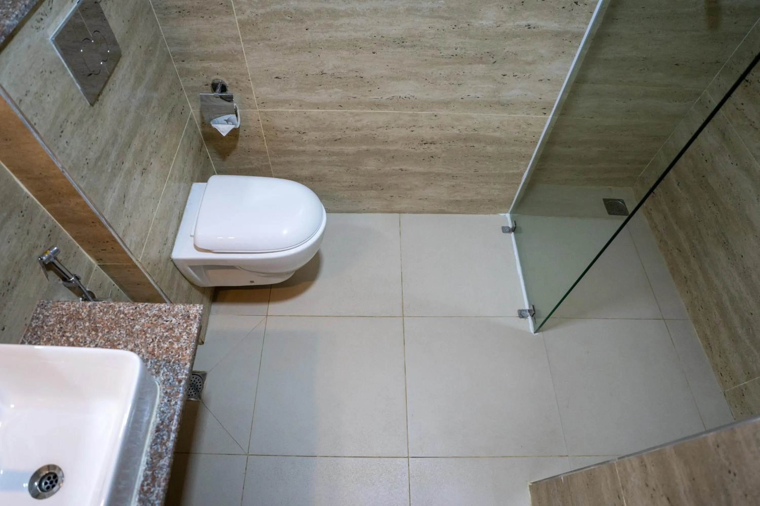 Toilet in Avocado Orchid Resort