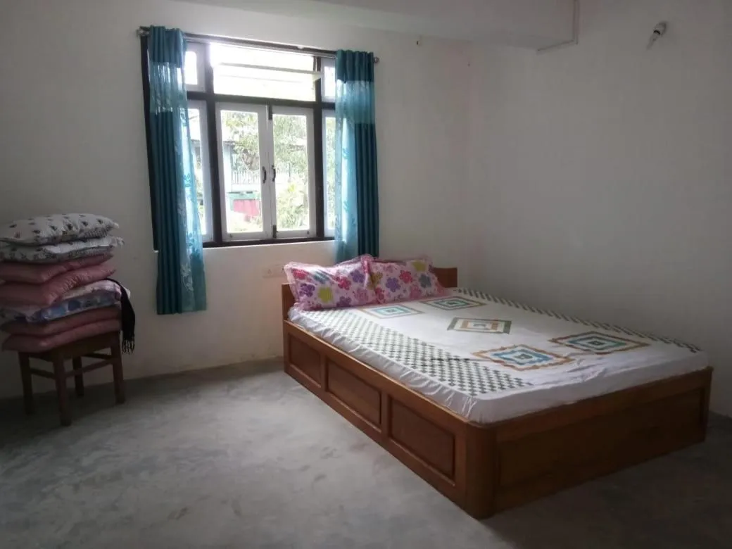 Bed in Kamala Homestay - Manyedara
