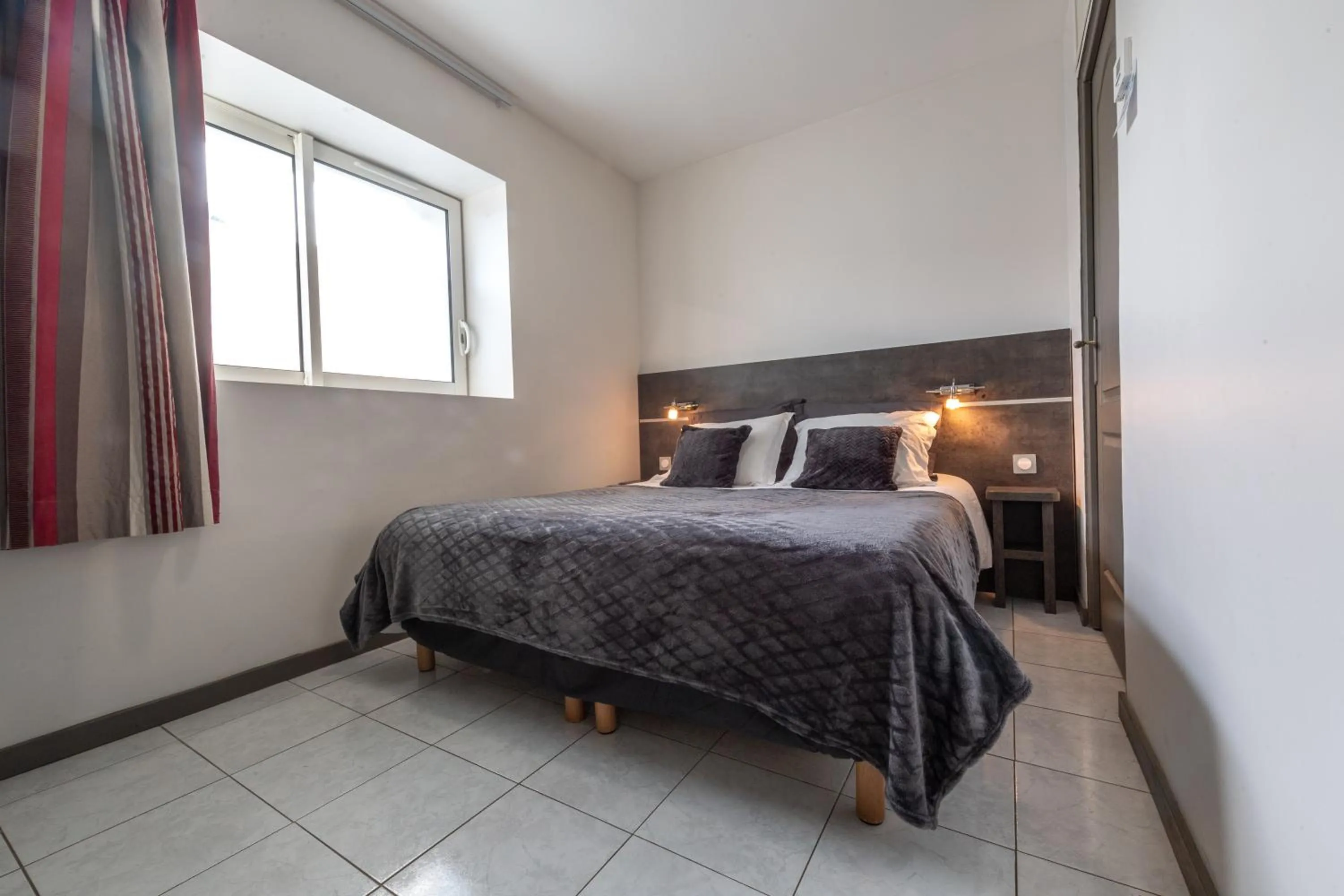 Bed in Hôtel de la Gare