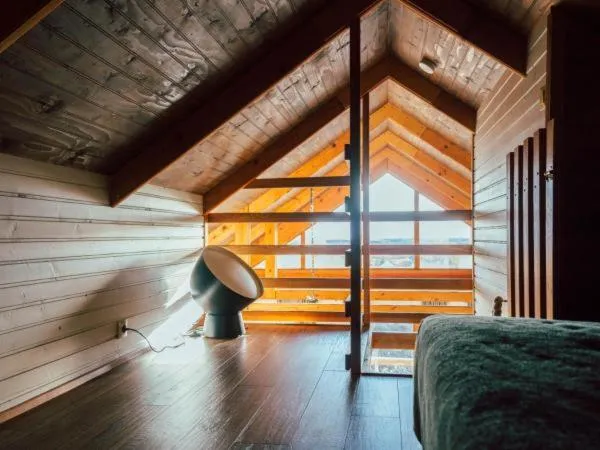 Bedroom in Mulakot Cosy Cabins