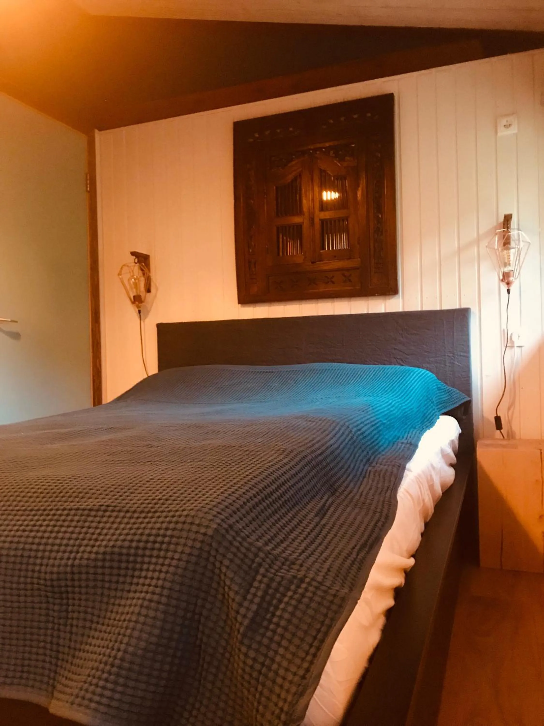 Bed in Mulakot Cosy Cabins