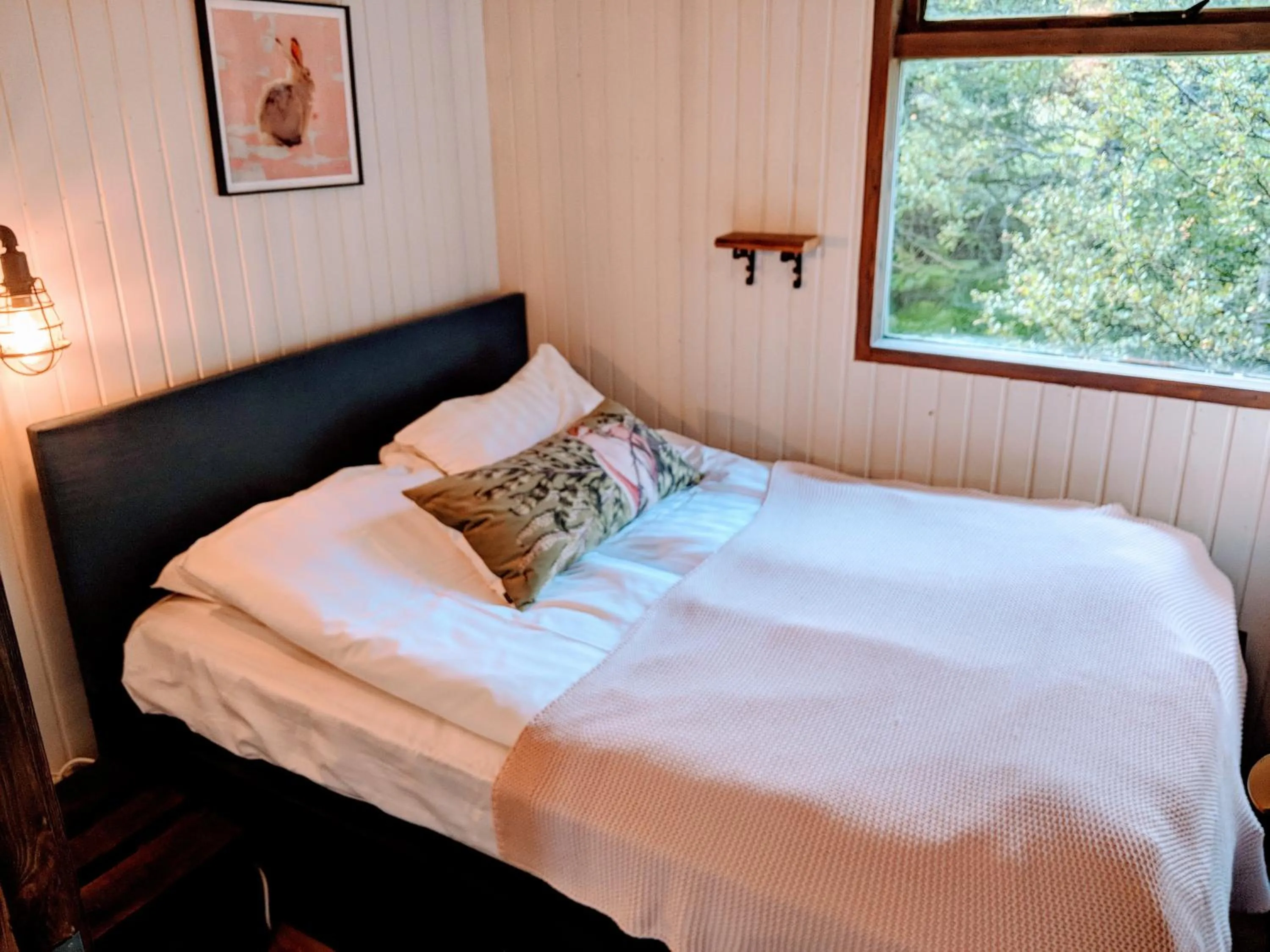 Bed in Mulakot Cosy Cabins