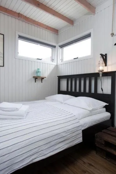 Bed in Mulakot Cosy Cabins