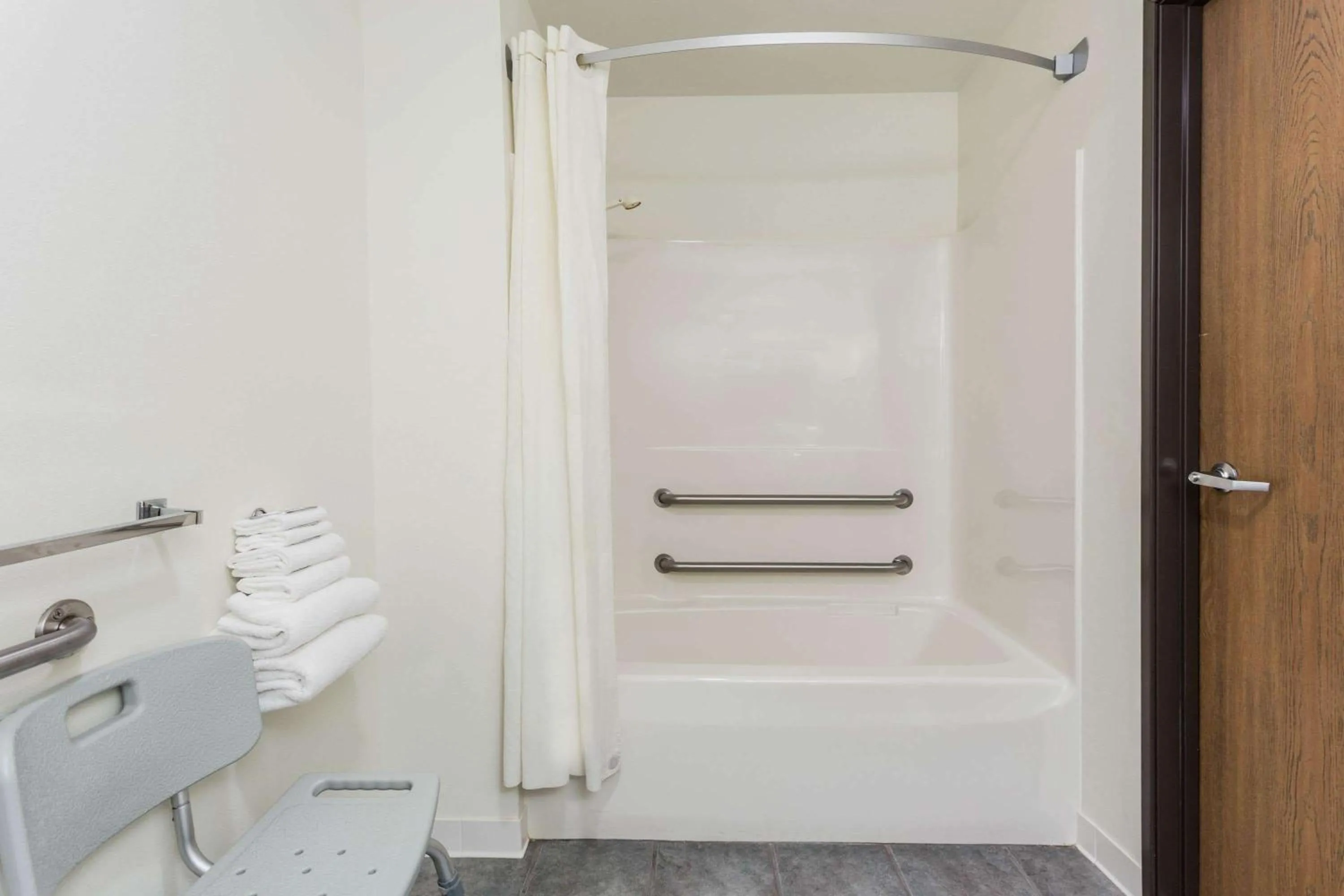 Bathroom in Super 8 by Wyndham Reedsburg