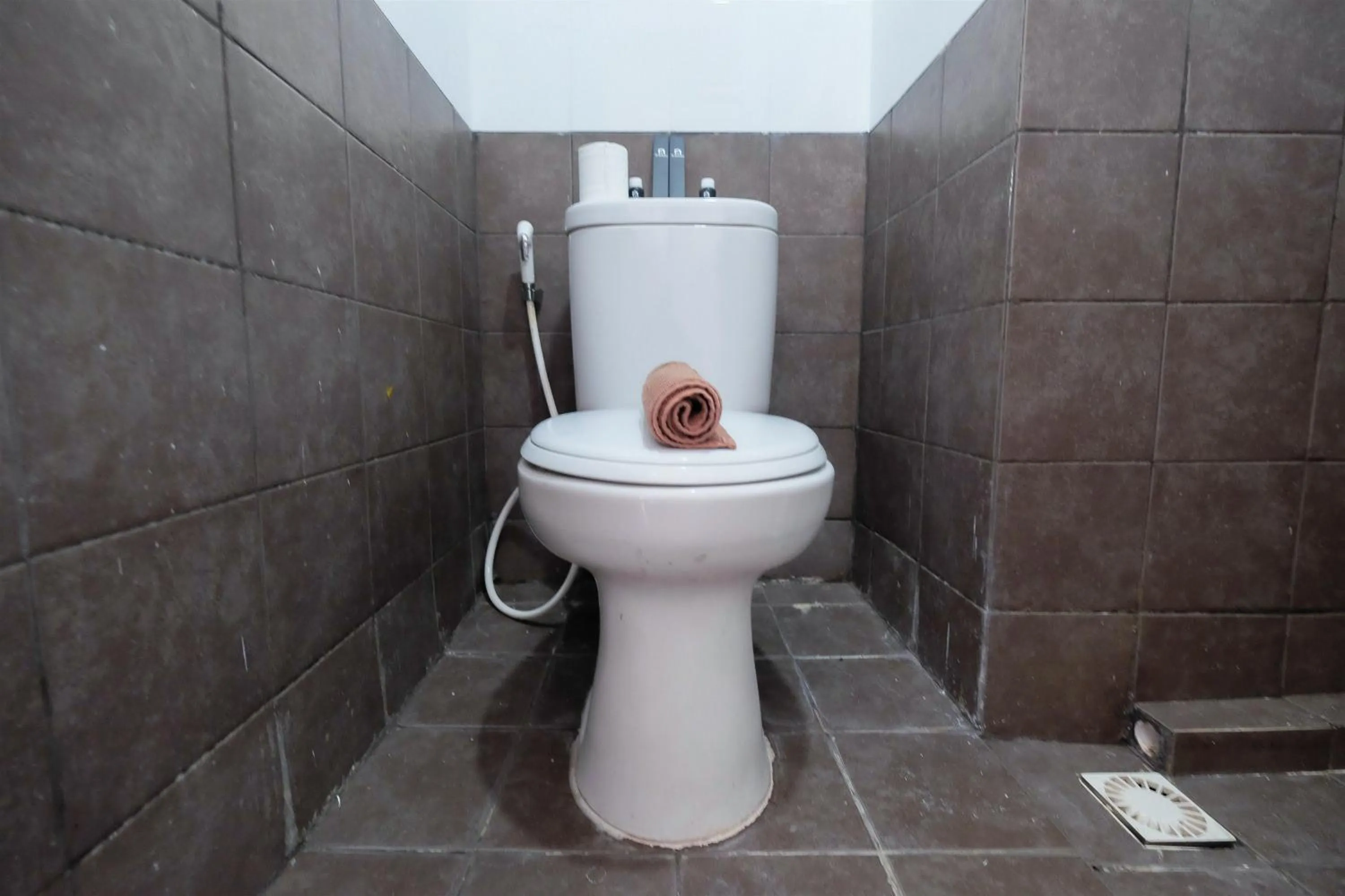 Homey and Relaxing 2BR Green Pramuka City Apartment By Travelio