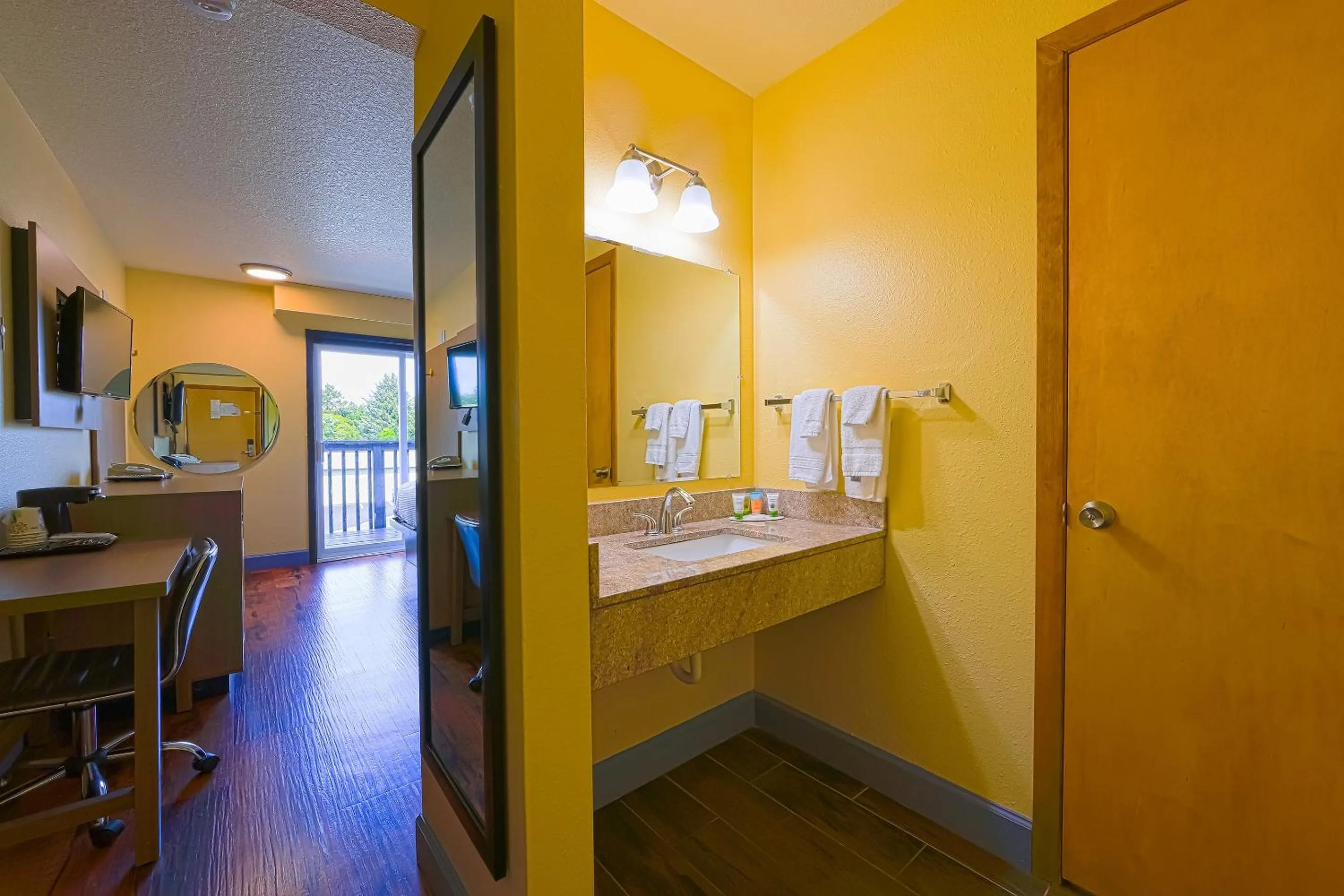 Bedroom in Coastal Inn by OYO Lincoln City - Oregon Coast Hwy