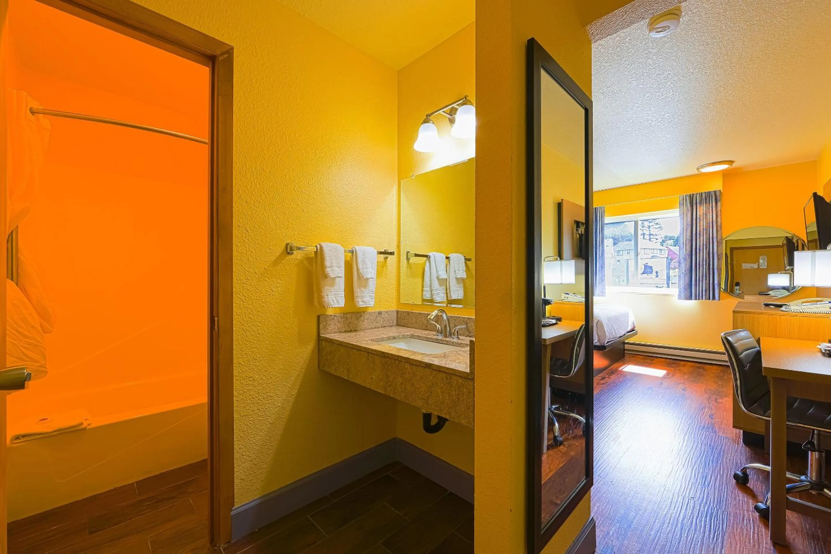 Bedroom in Coastal Inn by OYO Lincoln City - Oregon Coast Hwy