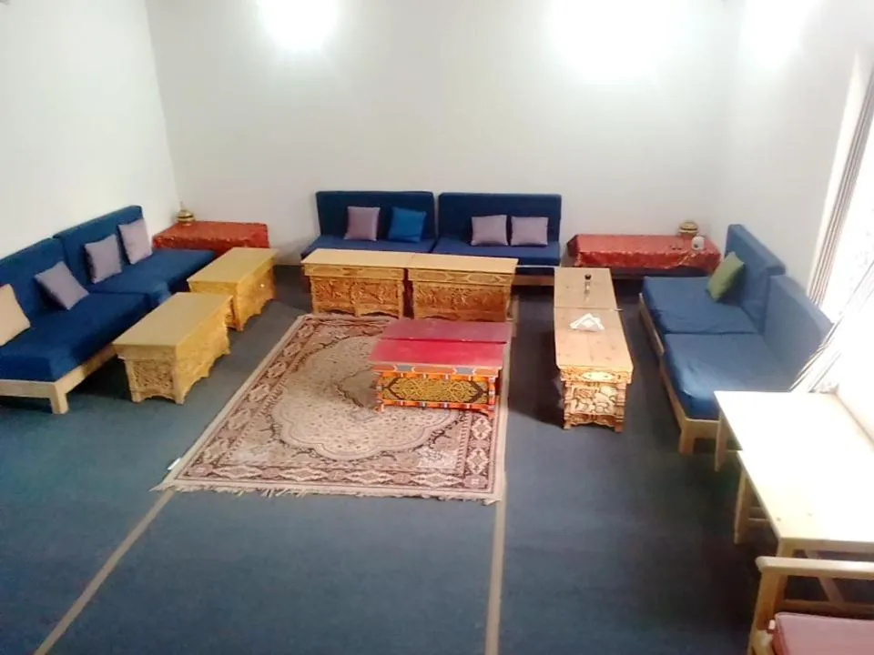 Seating area, Bed in Shuma Villa