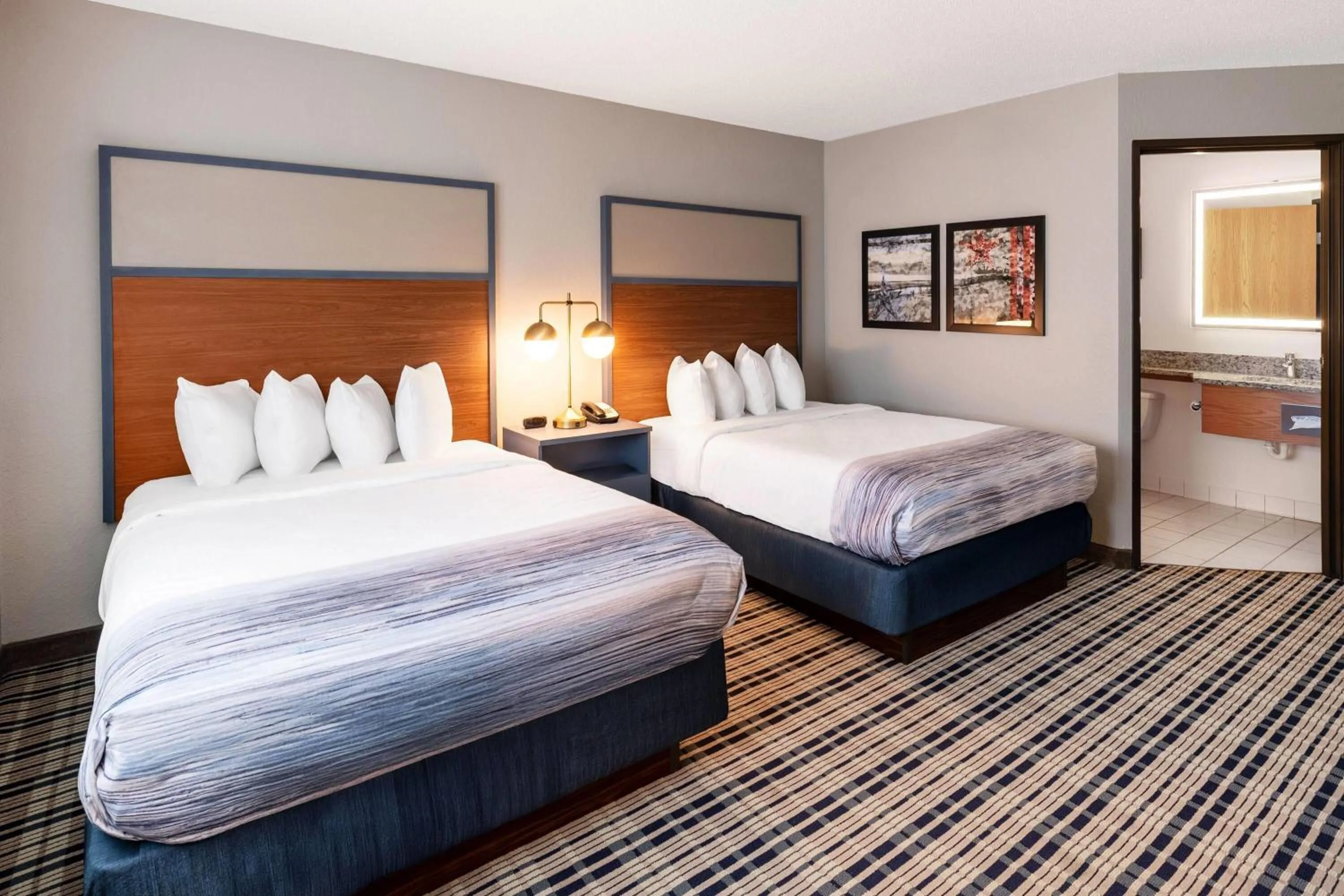 Bed in AmericInn by Wyndham Crookston U of M Crookston