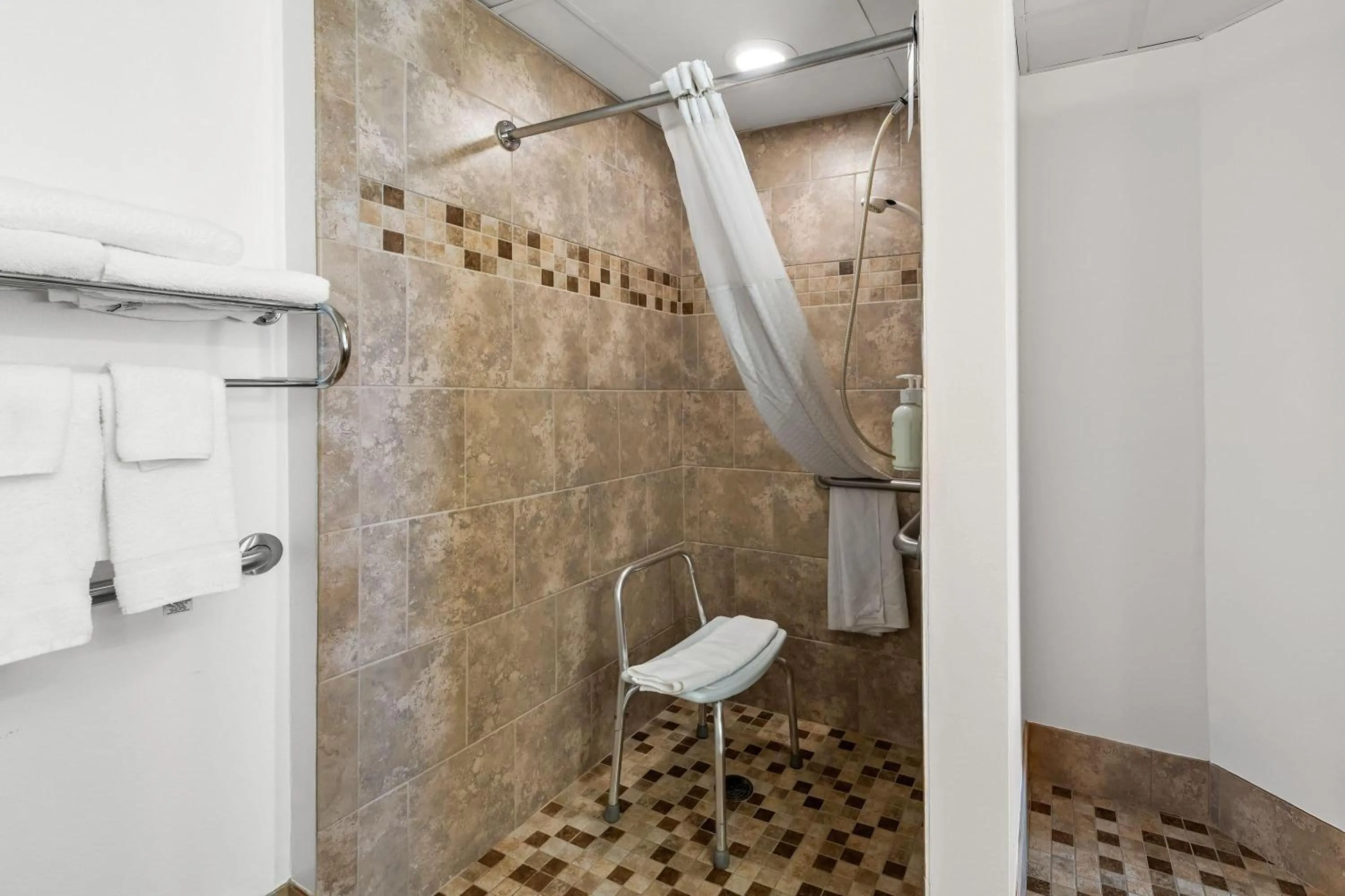 Shower in AmericInn by Wyndham Crookston U of M Crookston