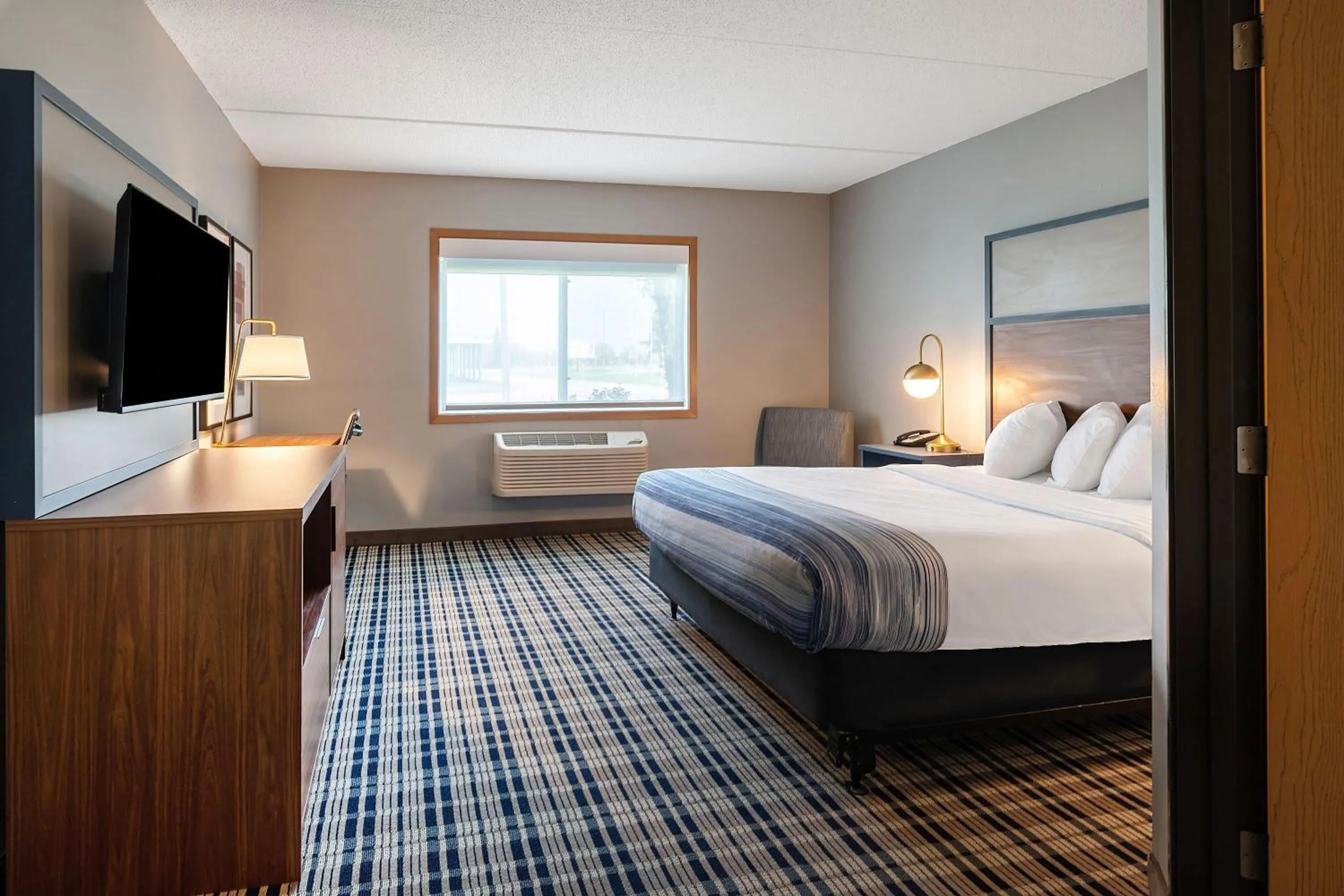 Bed in AmericInn by Wyndham Crookston U of M Crookston