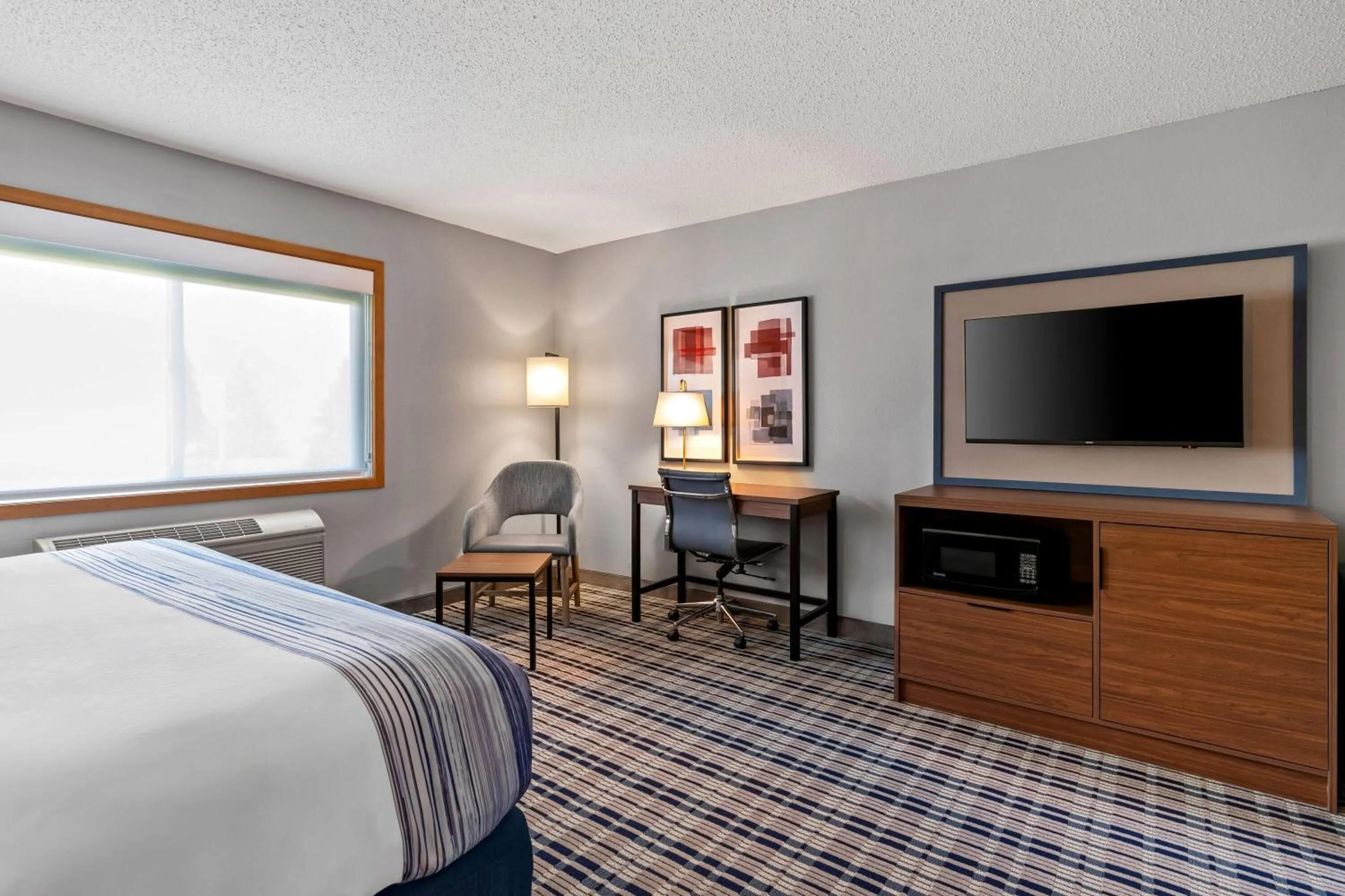 Bed in AmericInn by Wyndham Crookston U of M Crookston