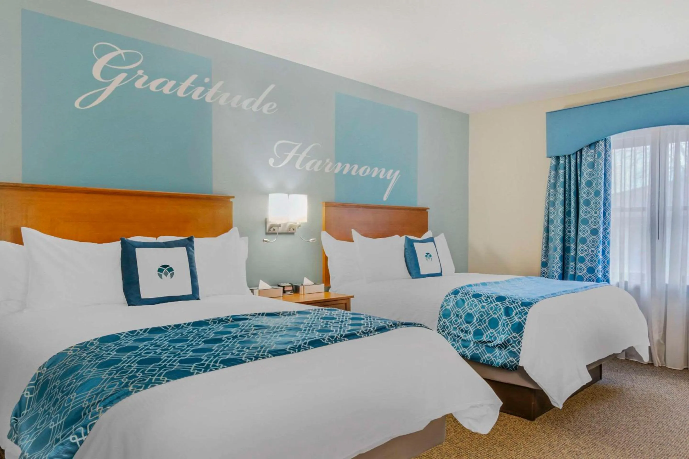 Bedroom, Bed in Unity Hotel and Conference Ctr, an Ascend Collection Hotel