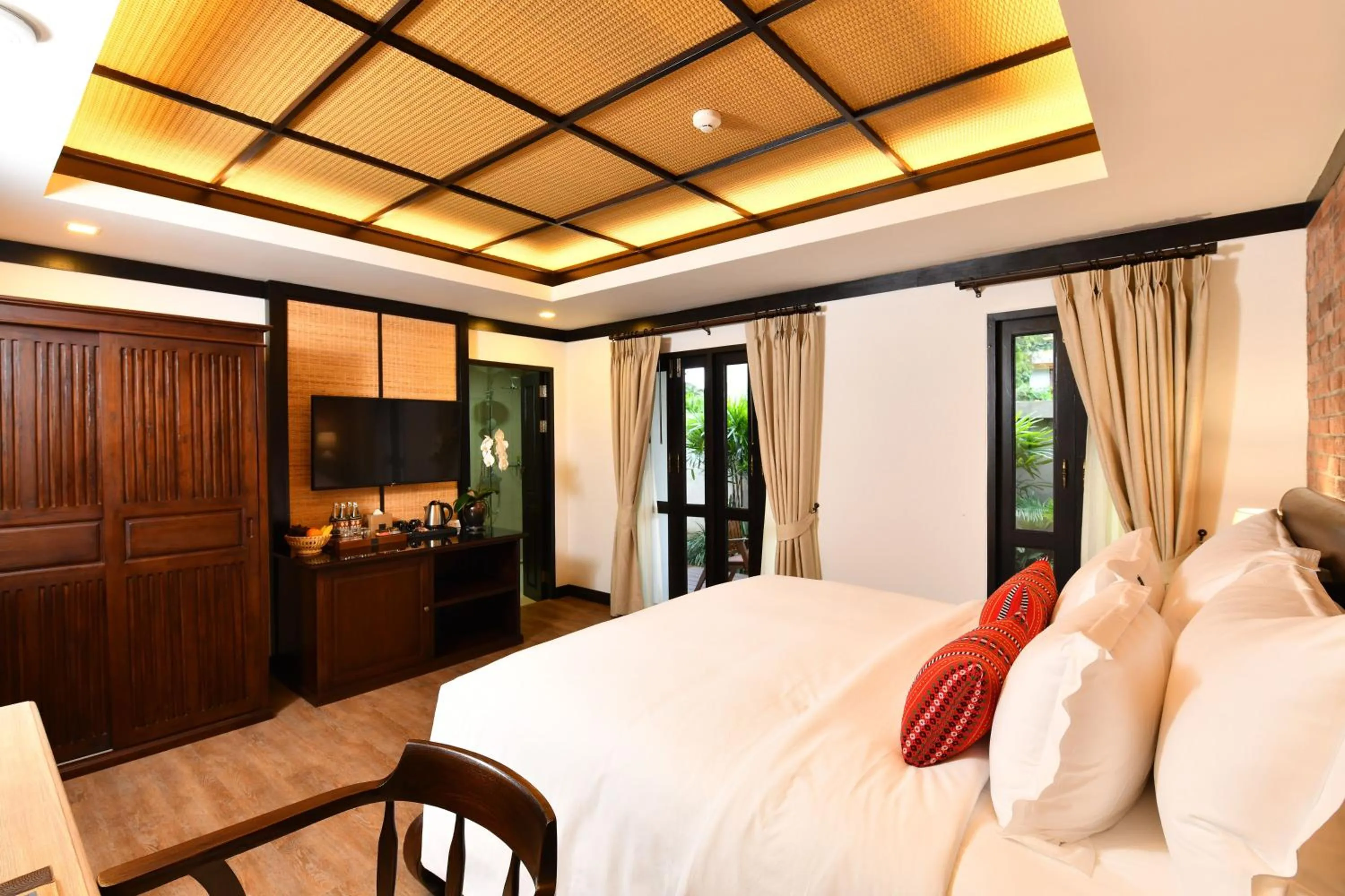 Photo of the whole room, Bed in El Barrio Lanna