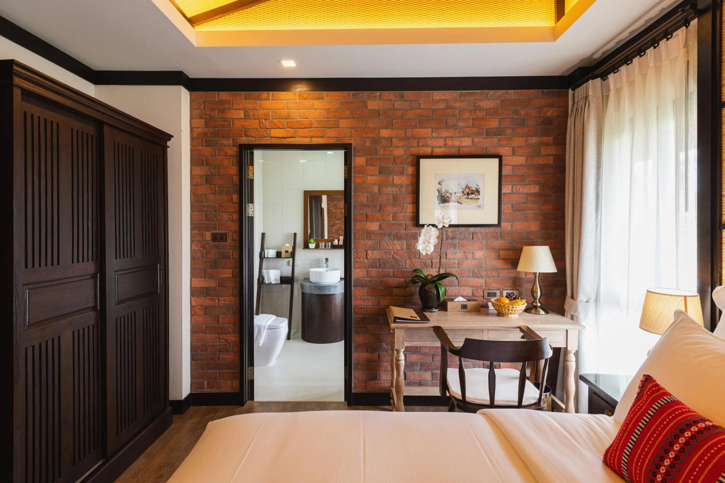 Seating area, Bed in El Barrio Lanna