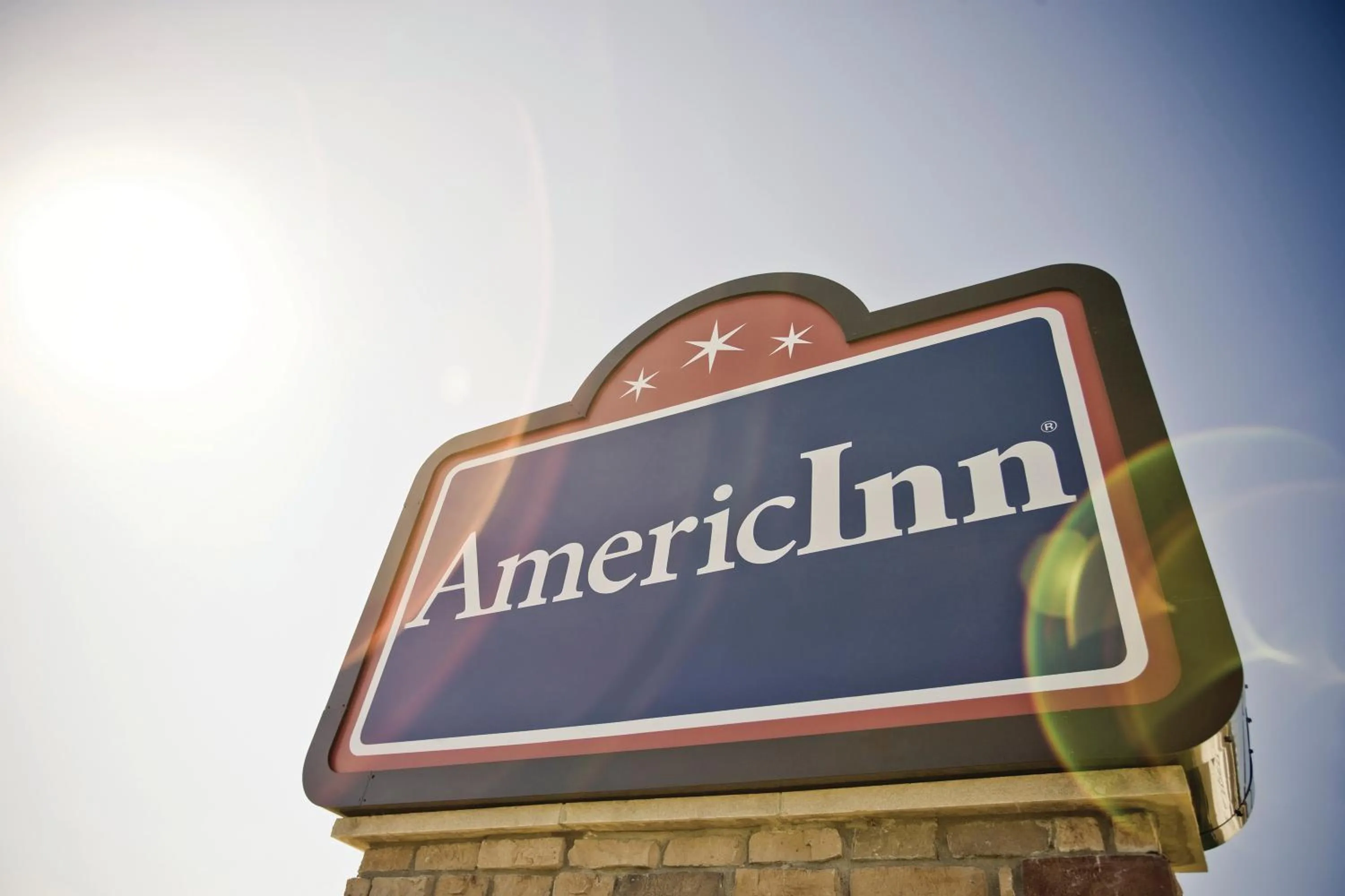 Property logo or sign in AmericInn by Wyndham Burlington
